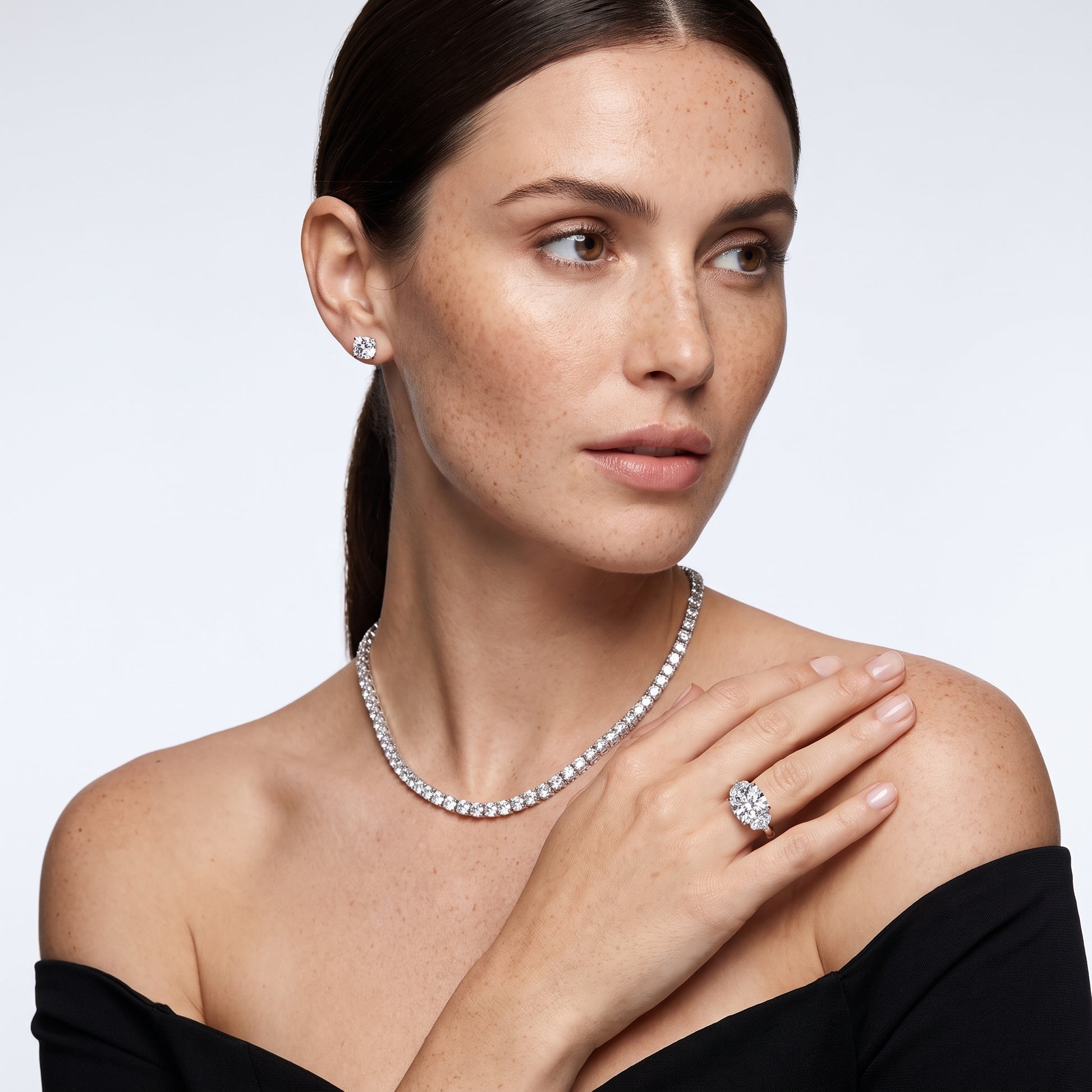 Romy Three-Stone Cushion Diamond Engagement Ring in Platinum - model.jpg