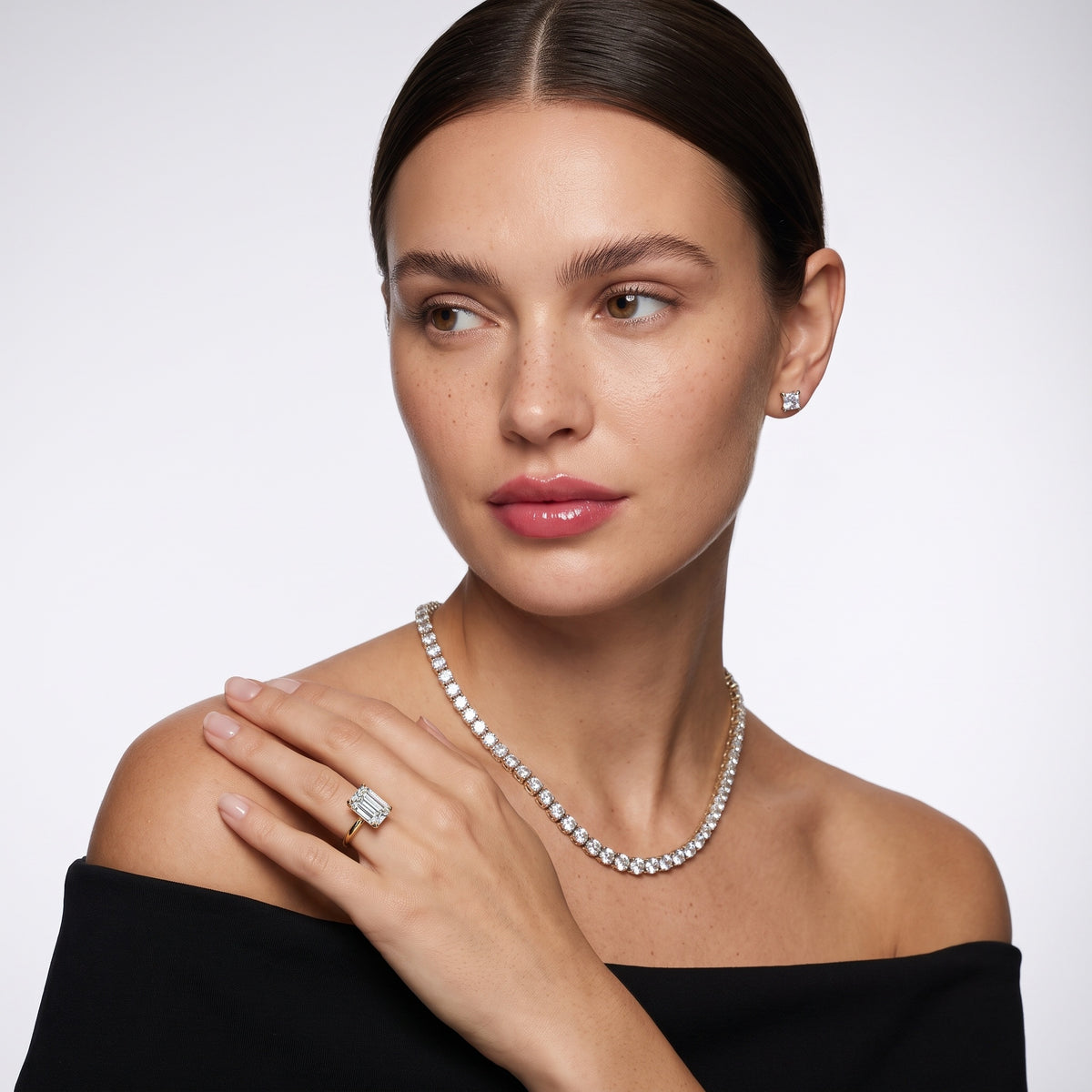 Marietta Tulip Solitaire Emerald Diamond Engagement Ring in Silver - model.jpg