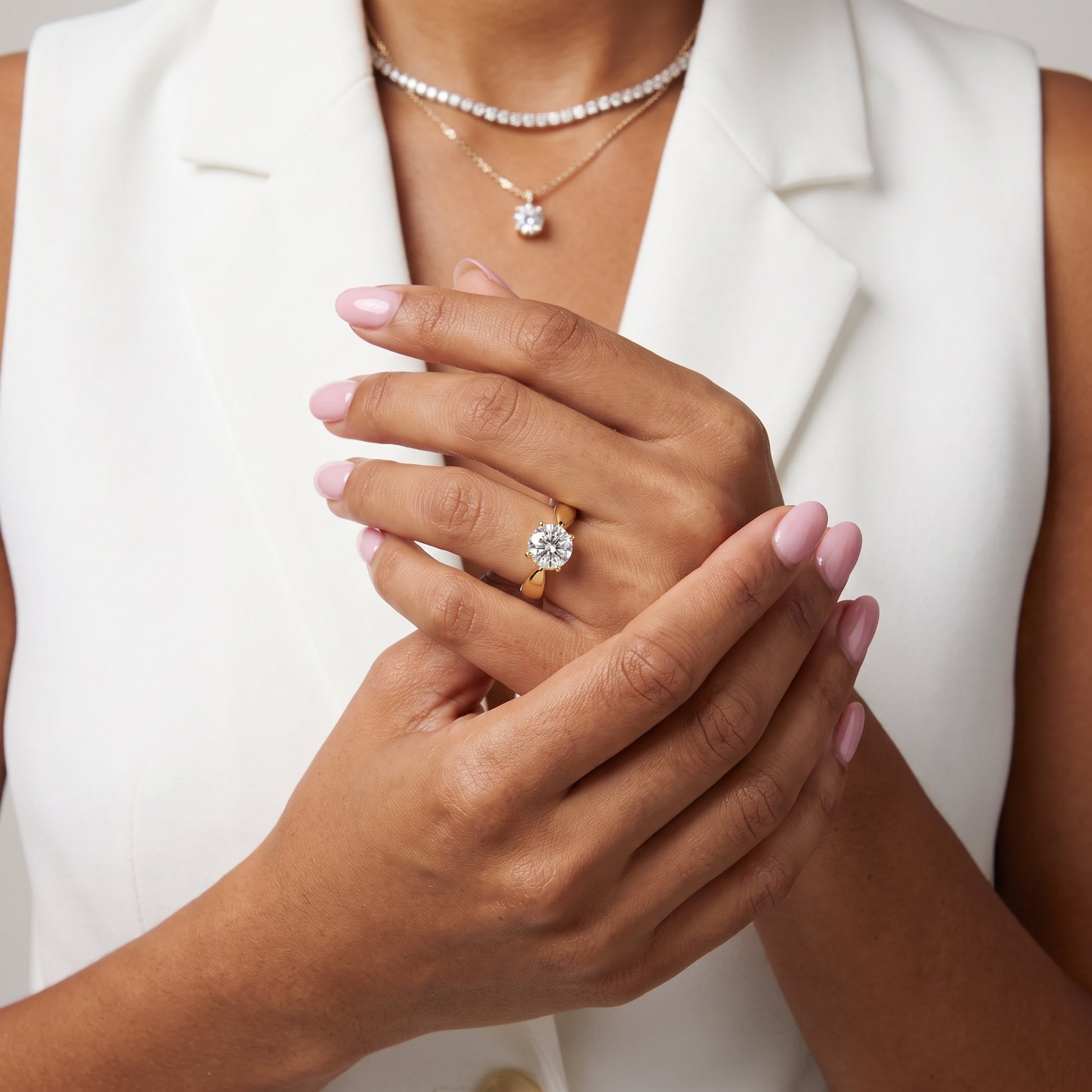 Talia Solitaire Twist Round Diamond Engagement Ring in Yellow Gold - model.jpg