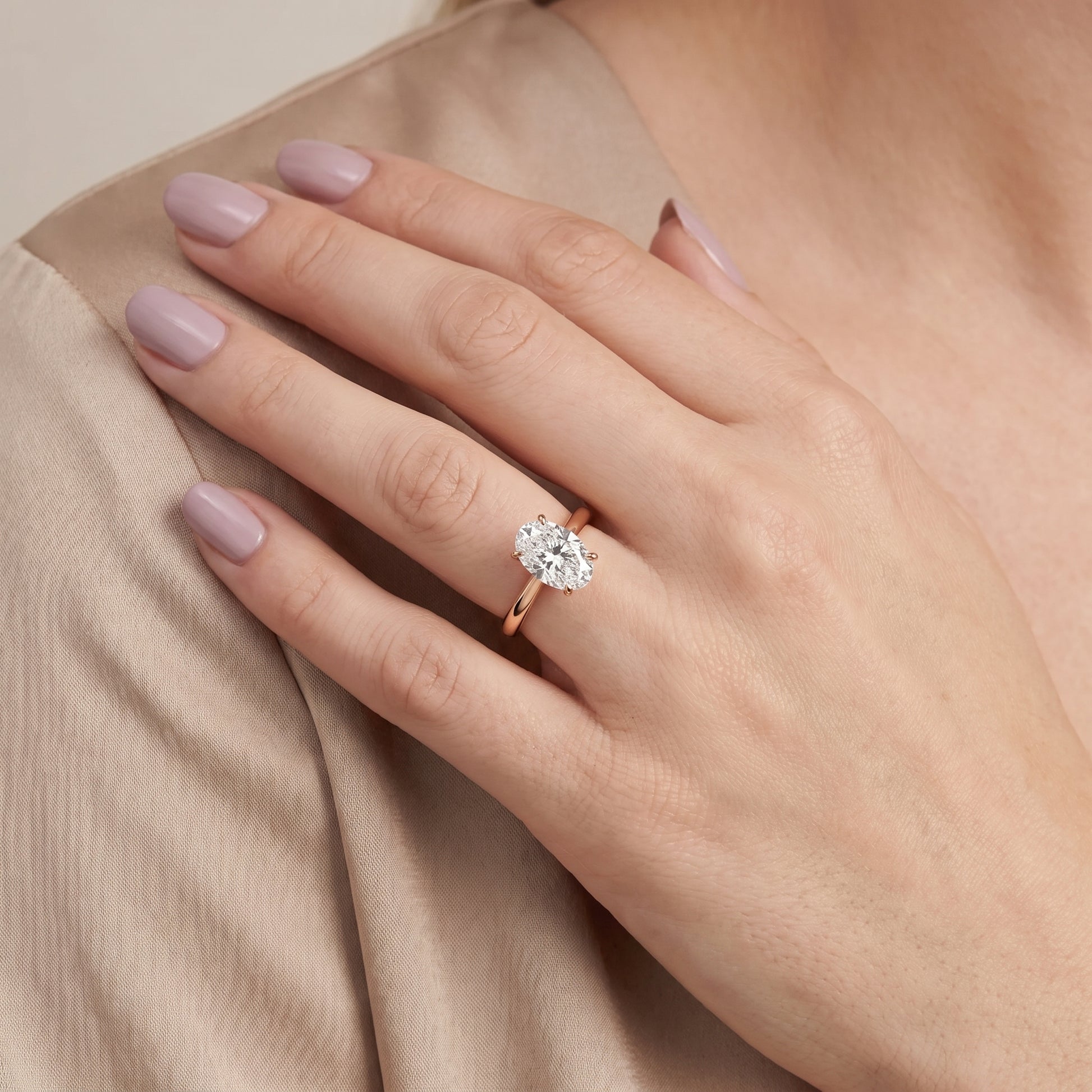 Kalia Knife Edge Solitaire Oval Diamond Engagement Ring in Rose Gold - model.jpg