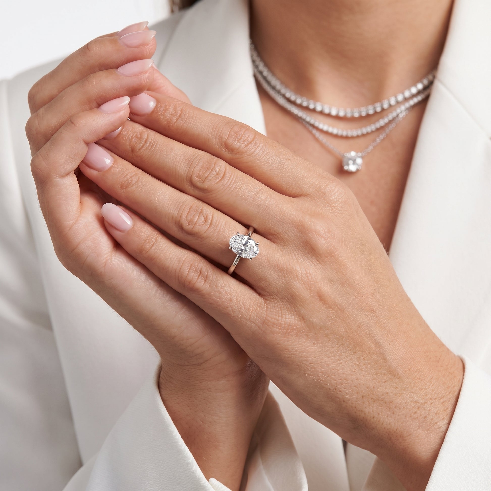 Amira Six-Prong Solitaire Oval Diamond Engagement Ring in Silver - model.jpg