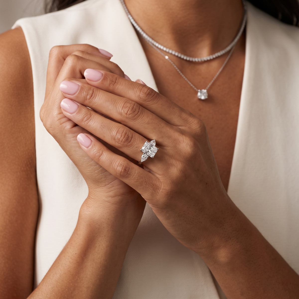Grace Three Stone Radiant Diamond Engagement Ring in Silver - model.jpg
