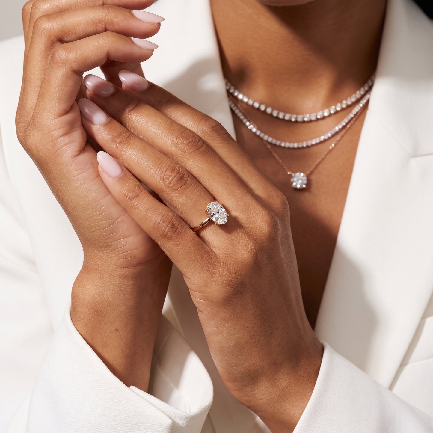 Nella Petite Solitaire Oval Diamond Engagement Ring in Rose Gold - model.jpg