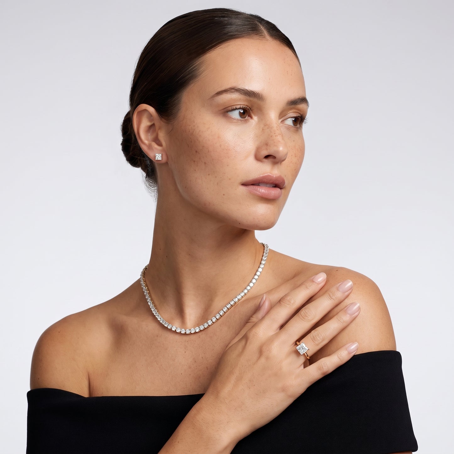 Evie Solitaire Six-Prong Princess Diamond Engagement Ring in Yellow Gold - model.jpg
