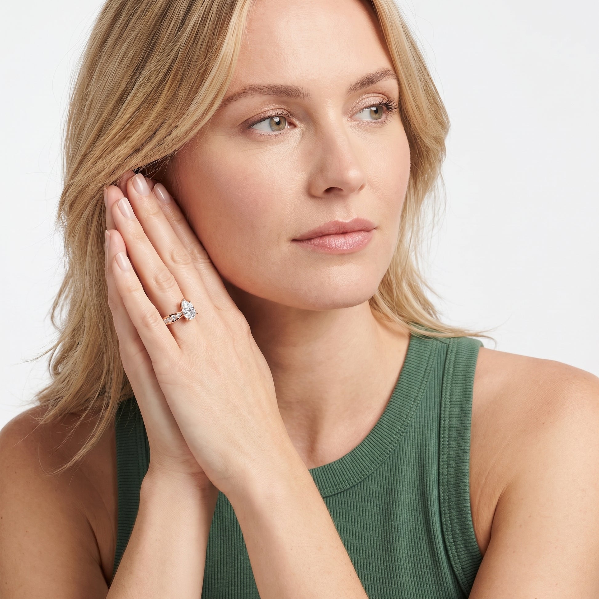 Noor Channel Set Sidestone Pear Diamond Engagement Ring in Rose Gold - model.jpg