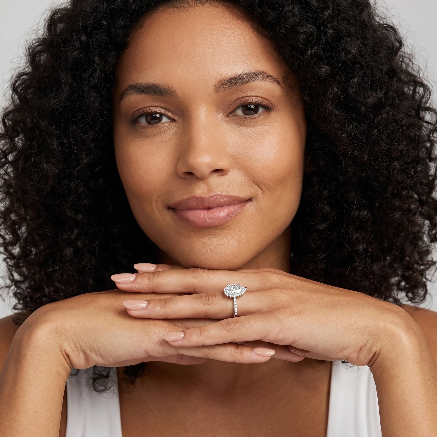 Alma Halo Pavé Pear Diamond Ring in Platinum - model.jpg