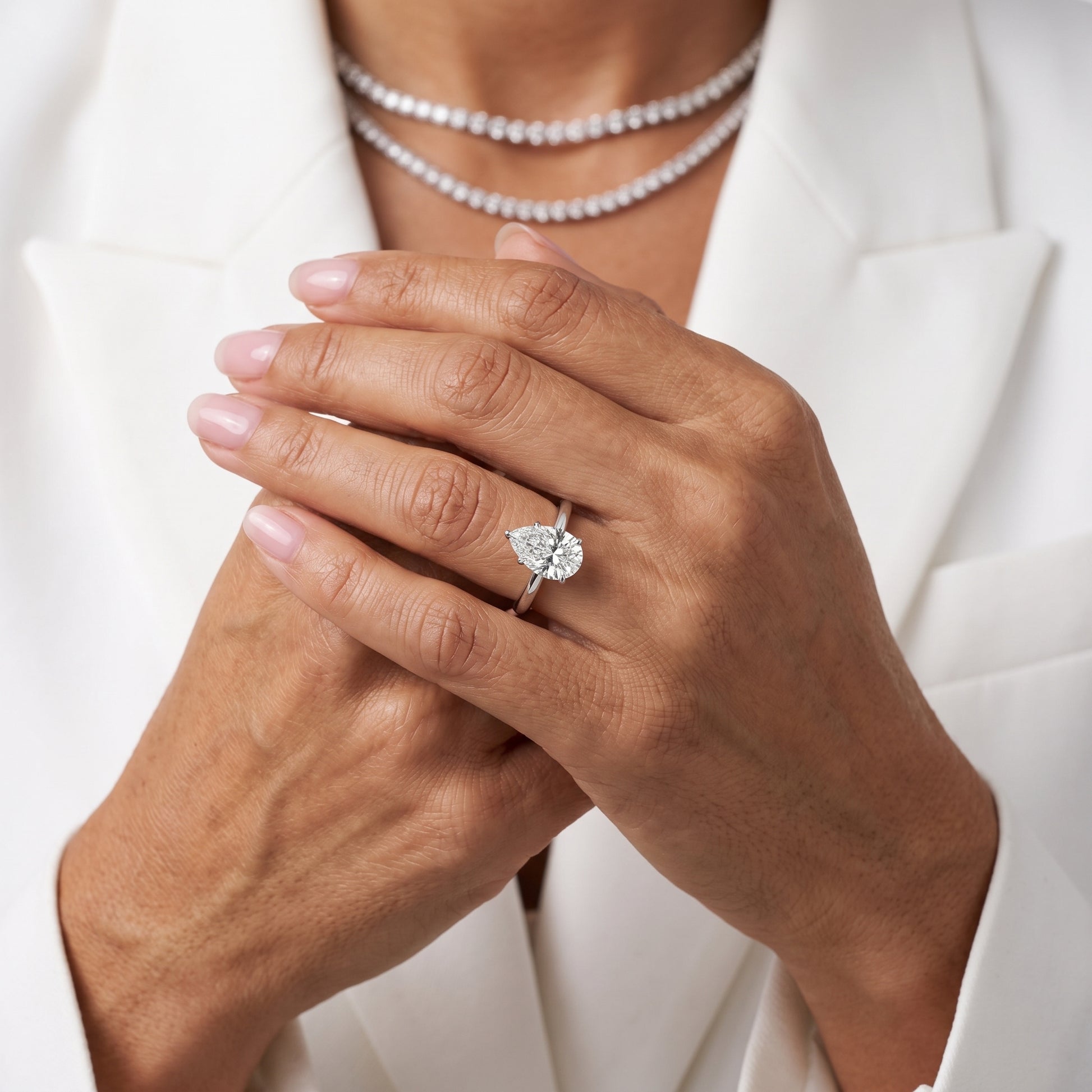 Amaya Hidden Halo Pear Diamond Ring in Silver - model.jpg
