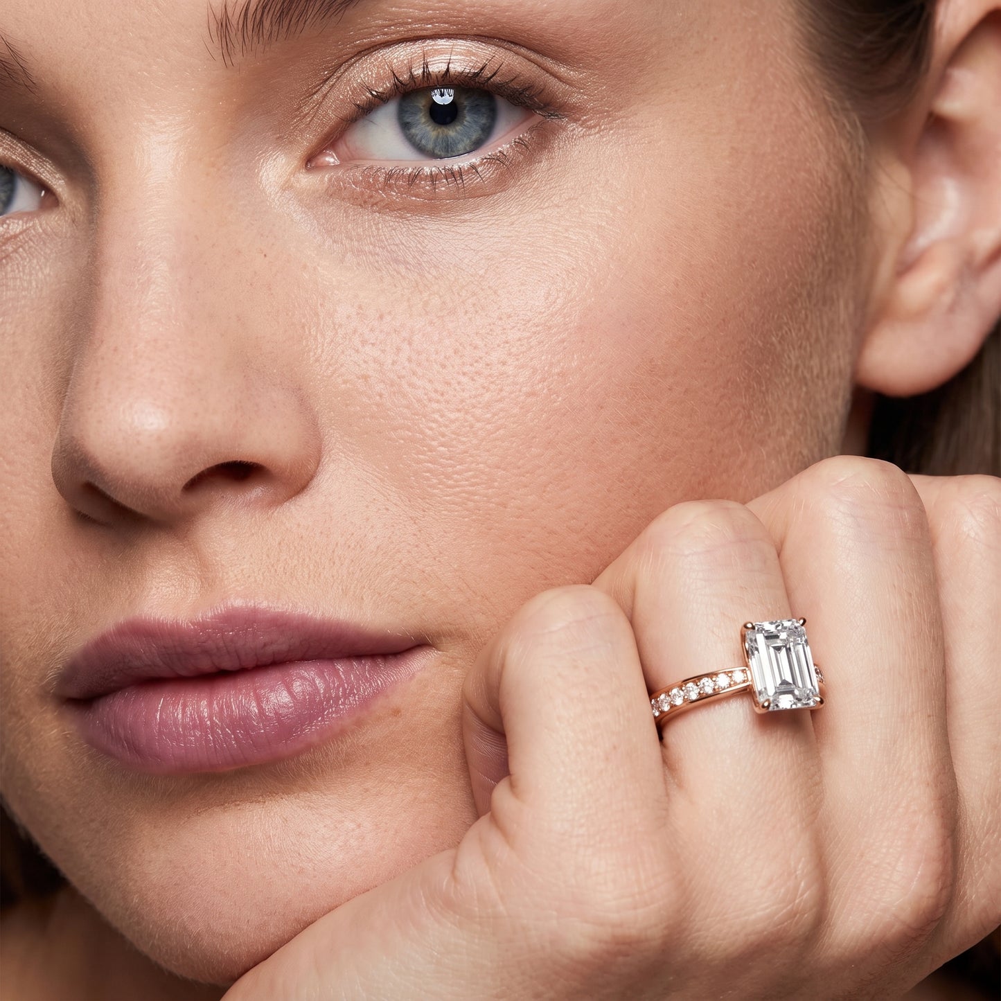 Rhea Sidestone Pavé Emerald Diamond Engagement Ring in Rose Gold - model.jpg