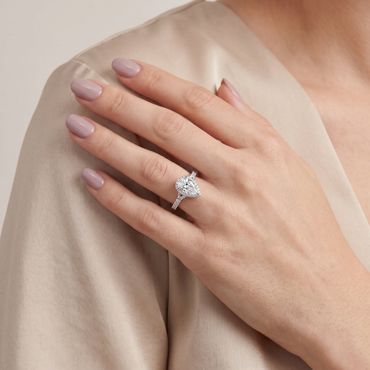 Bella Halo Pavé Pear Diamond Engagement Ring in Silver - model.jpg