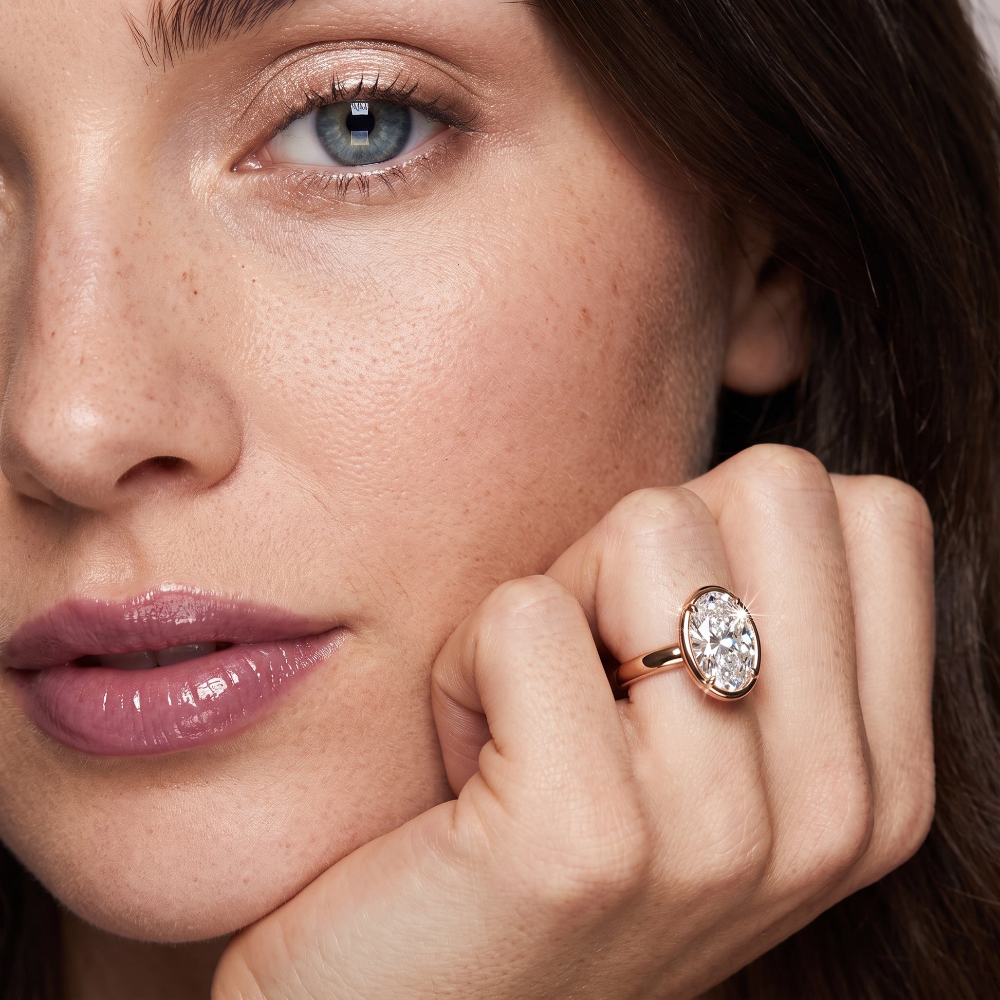 Alina Bezel Solitaire Oval Diamond Ring in Rose Gold - model.jpg