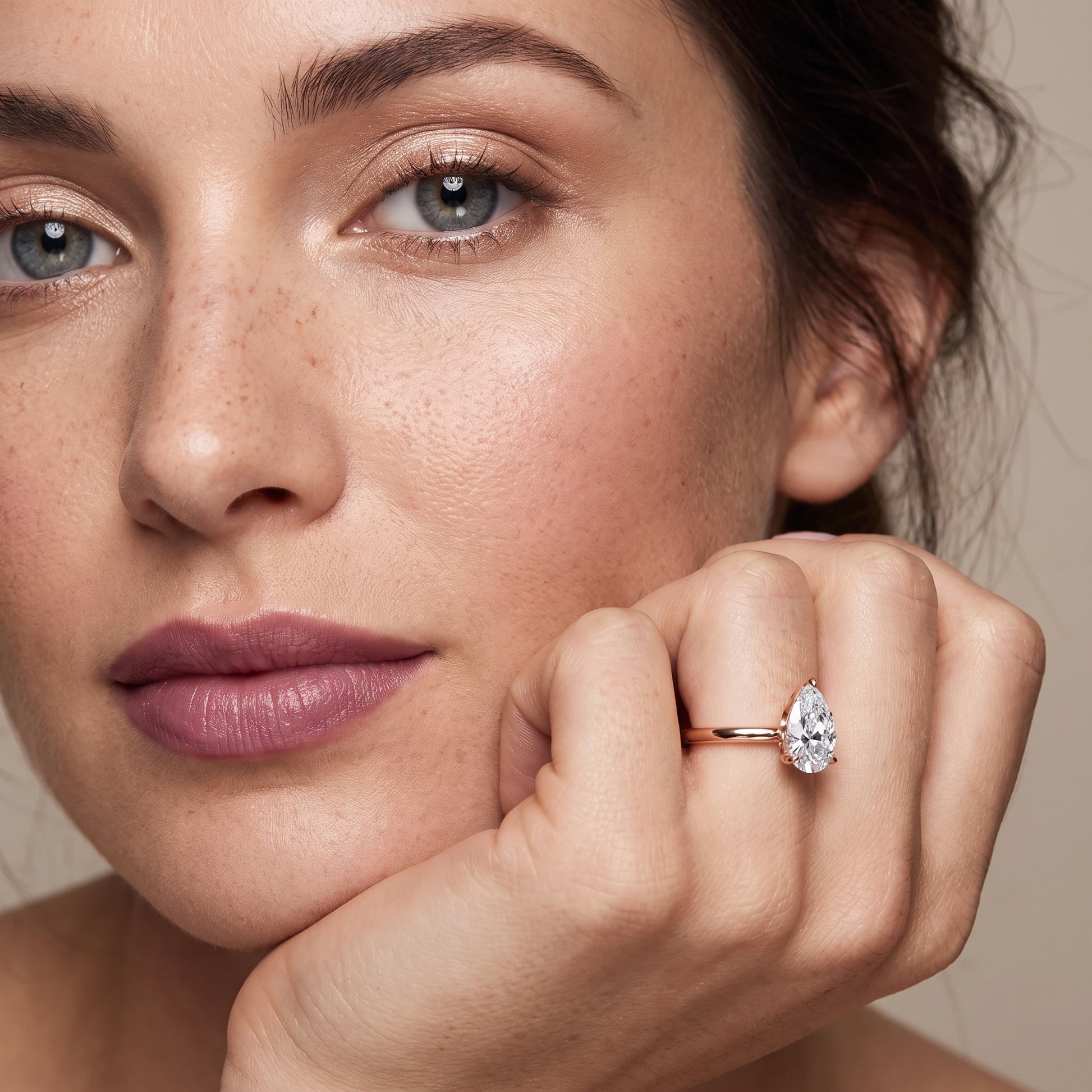 Evie Solitaire Six-Prong Pear Diamond Engagement Ring in Rose Gold - model.jpg