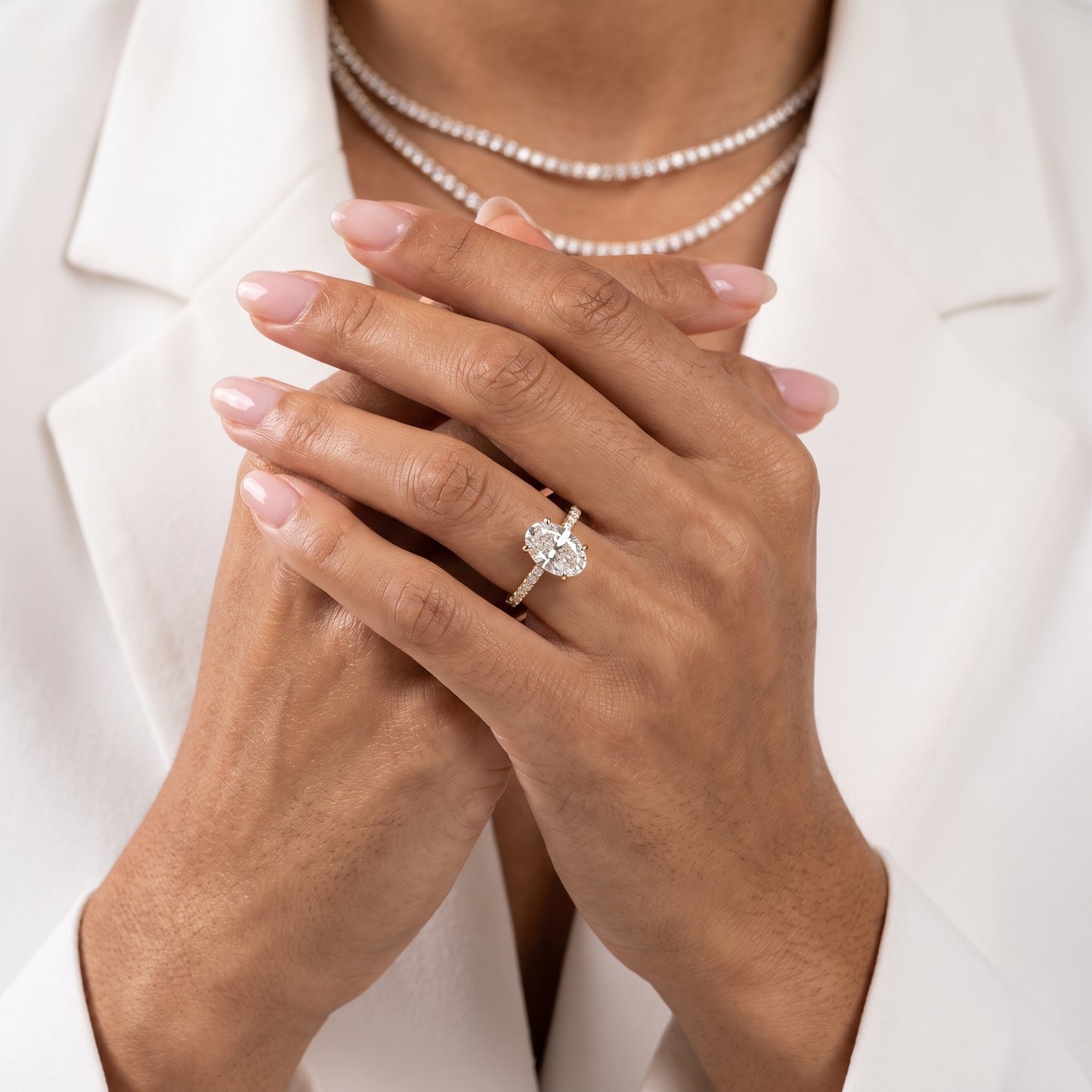 Ione Solitaire Pavé Oval Diamond Engagement Ring in Yellow Gold - model.jpg