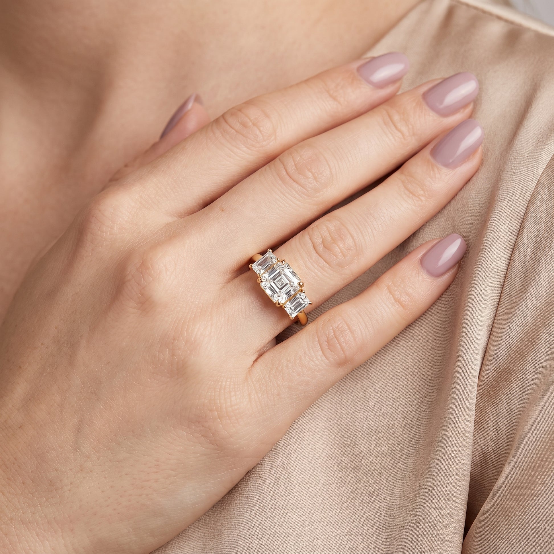 Zoe Three-Stone Asscher Diamond Ring in Yellow Gold - model.jpg