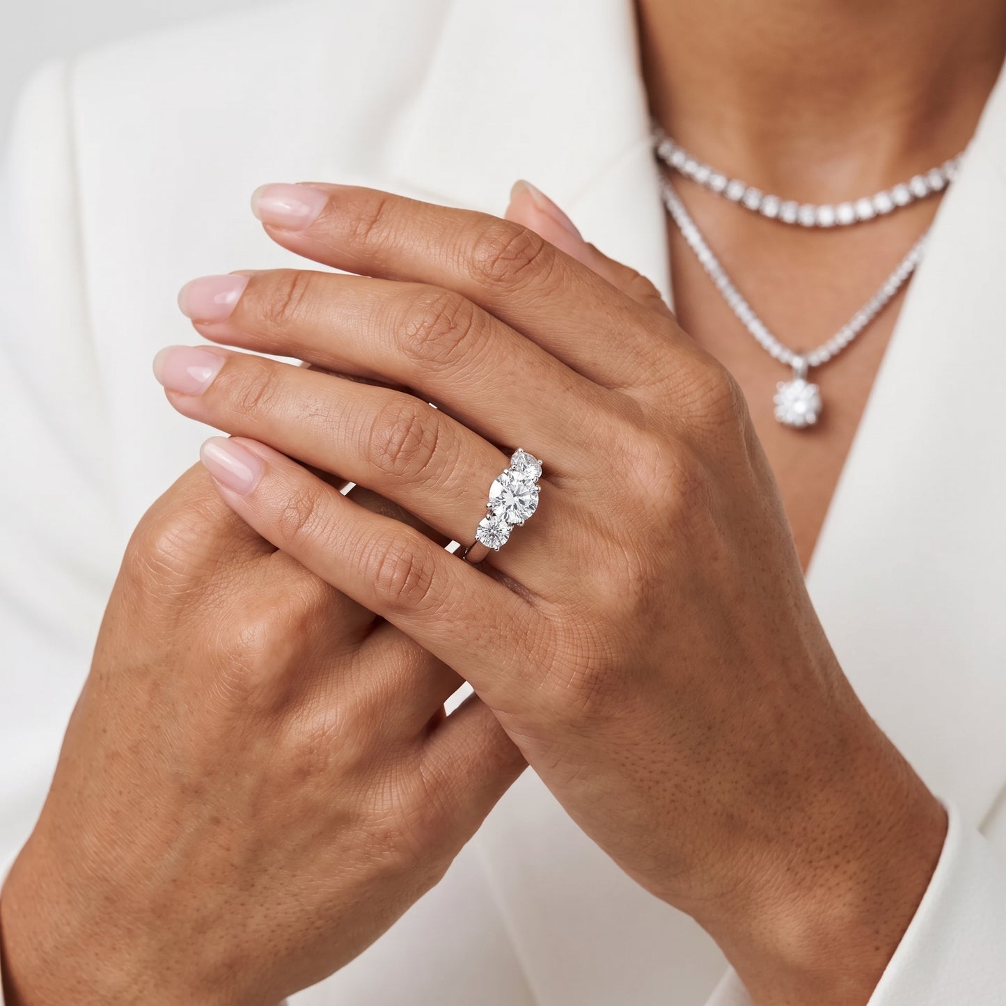 Esme Three-Stone Tapered Round Diamond Ring in White Gold - model.jpg