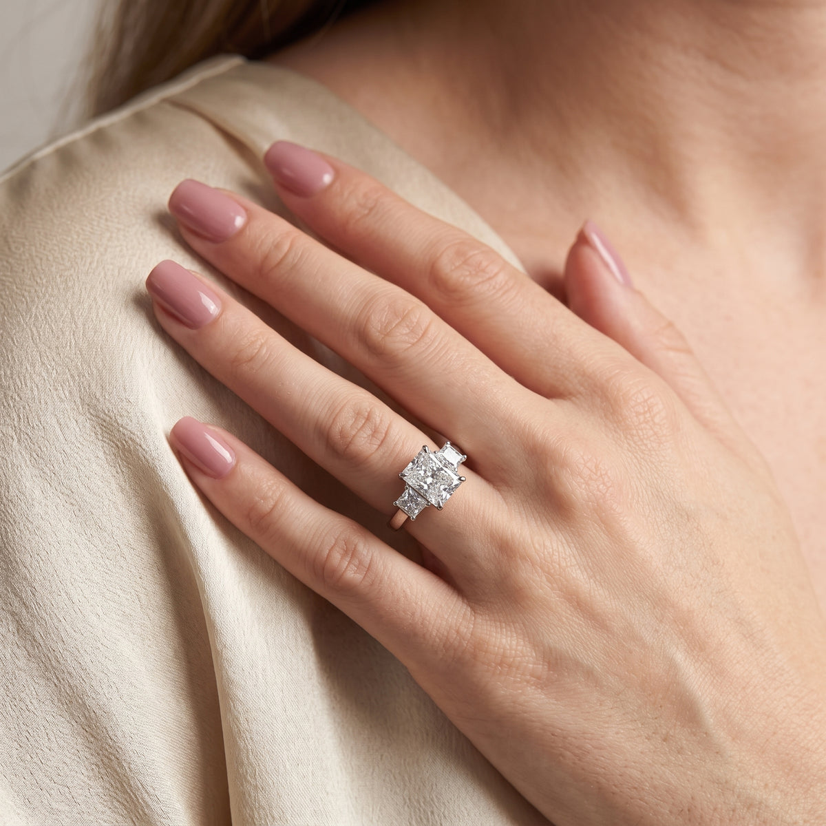 Sienna Three-Stone Radiant Diamond Engagement Ring in Platinum - model.jpg