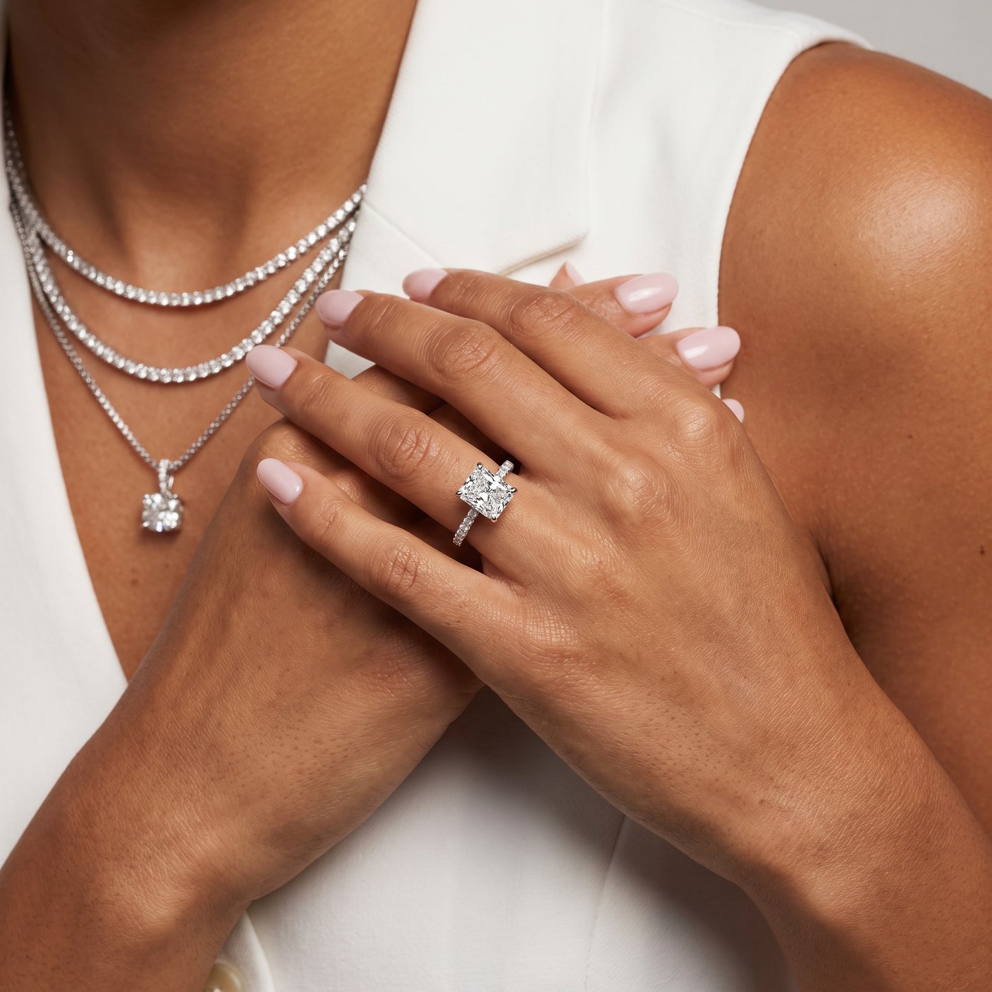 Aisha Pavé Solitaire Radiant Diamond Engagement Ring in Platinum - model.jpg