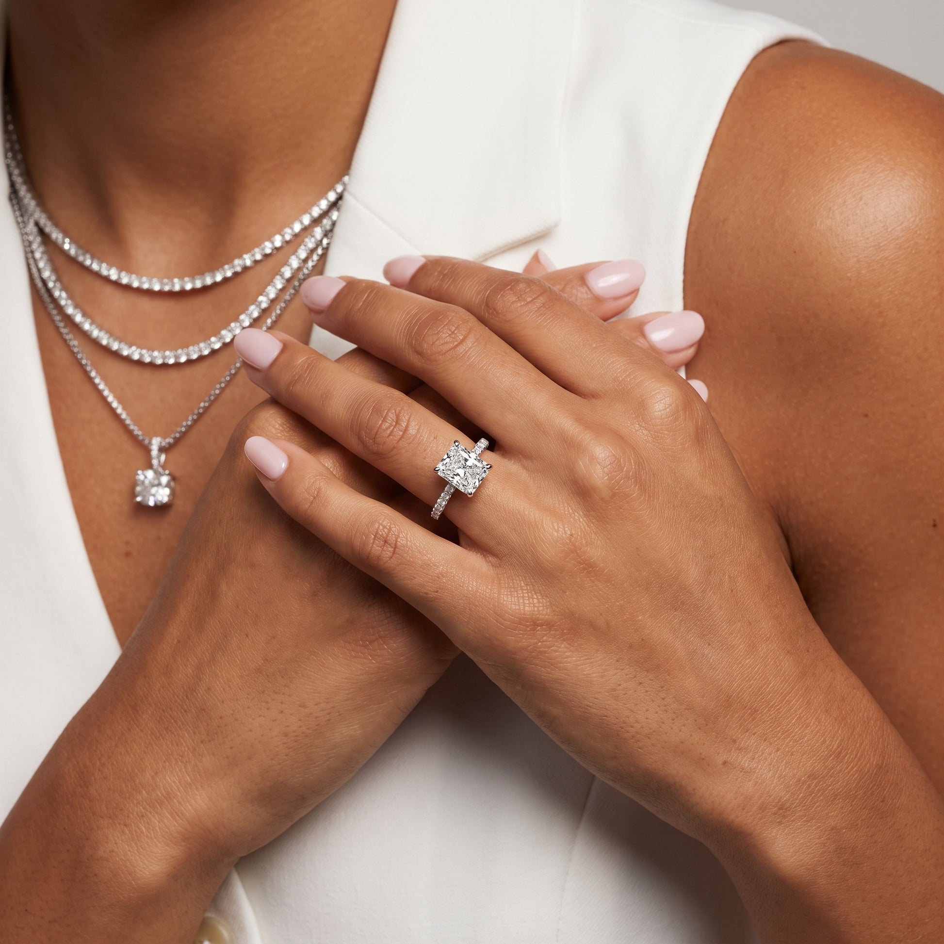 Aisha Pavé Solitaire Radiant Diamond Engagement Ring in Platinum - model.jpg