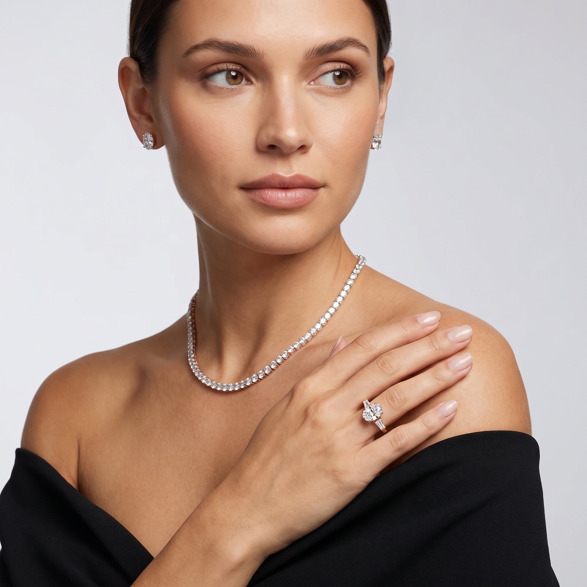 Layla Tapered Baguette Oval Diamond Ring in Rose Gold - model.jpg