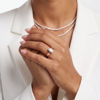 Talia Solitaire Twist Oval Diamond Engagement Ring in Rose Gold - model.jpg