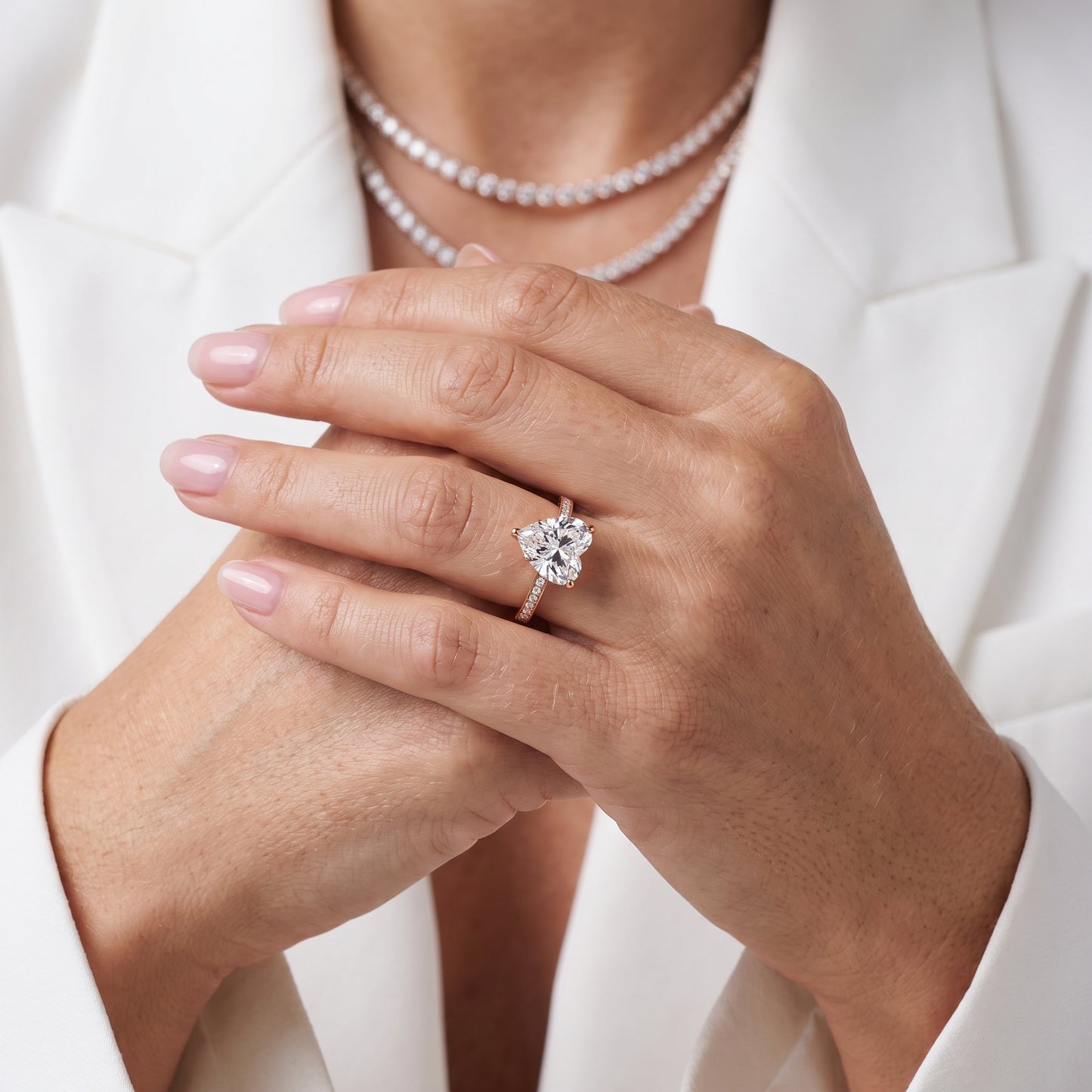 Naia Hidden Halo Heart Diamond Ring in Rose Gold - model.jpg