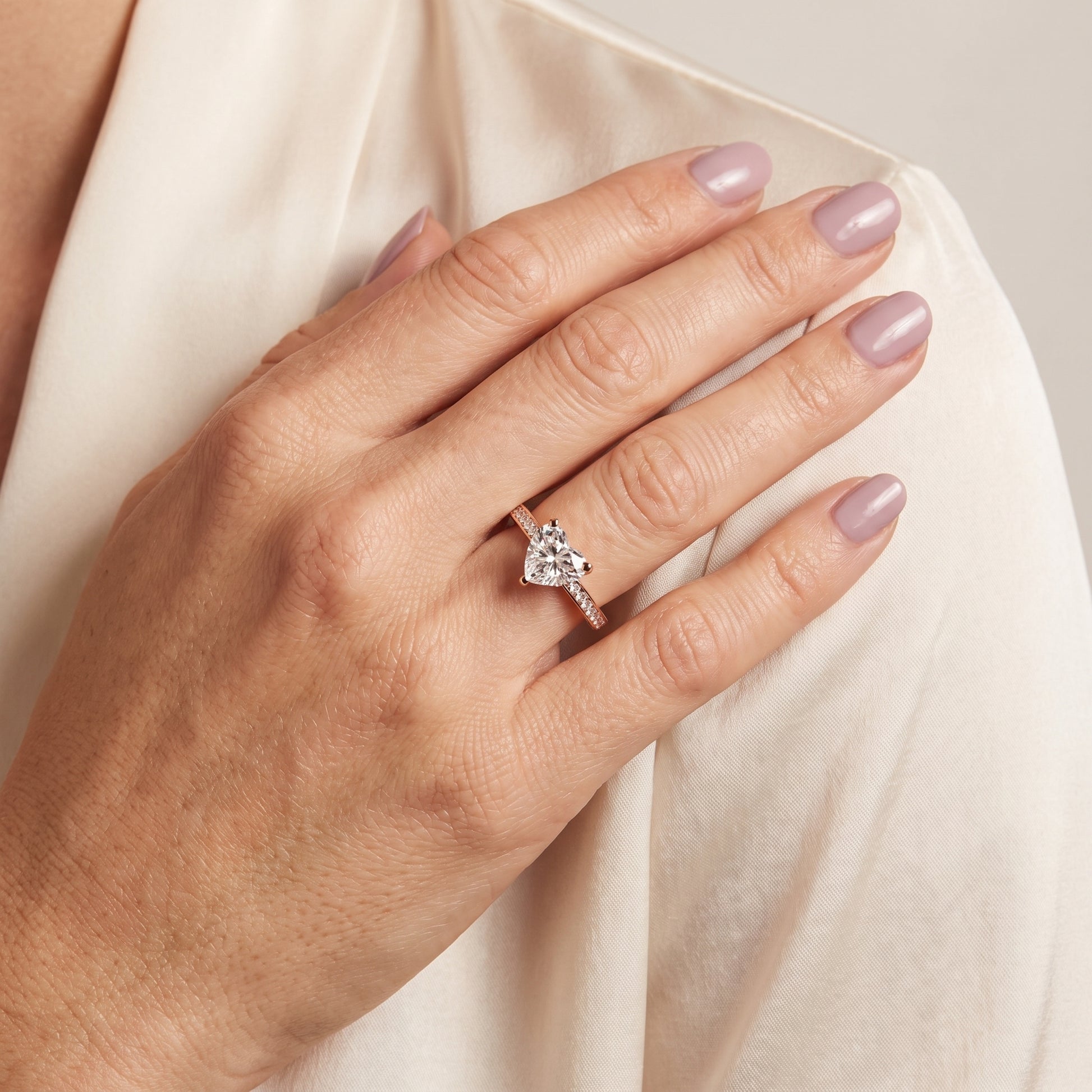 Tessa Solitaire Channel Set Heart Diamond Engagement Ring in Rose Gold - model.jpg