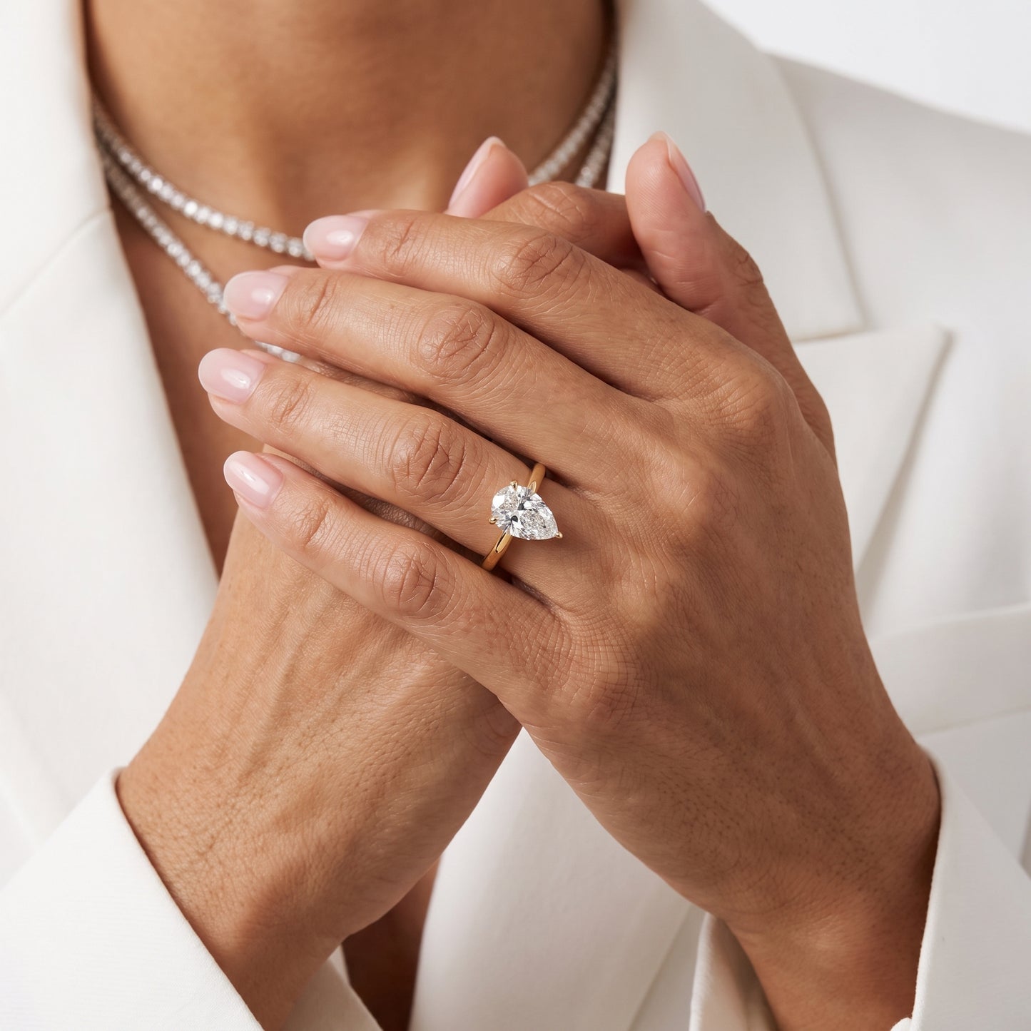 Liana Solitaire Claw Prong Pear Diamond Engagement Ring in Yellow Gold - model.jpg