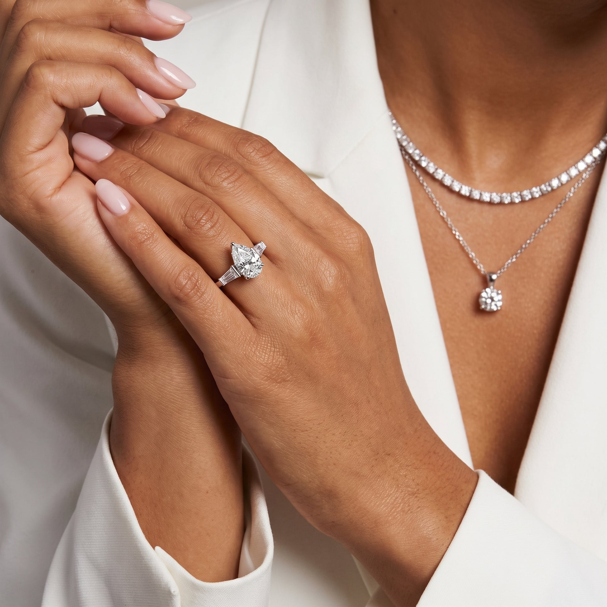 Layla Tapered Baguette Pear Diamond Ring in Silver - model.jpg