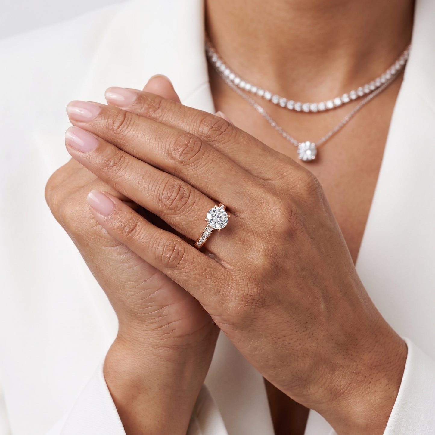 Maren Sidestone Channel Set Round Diamond Engagement Ring in Rose Gold - model.jpg