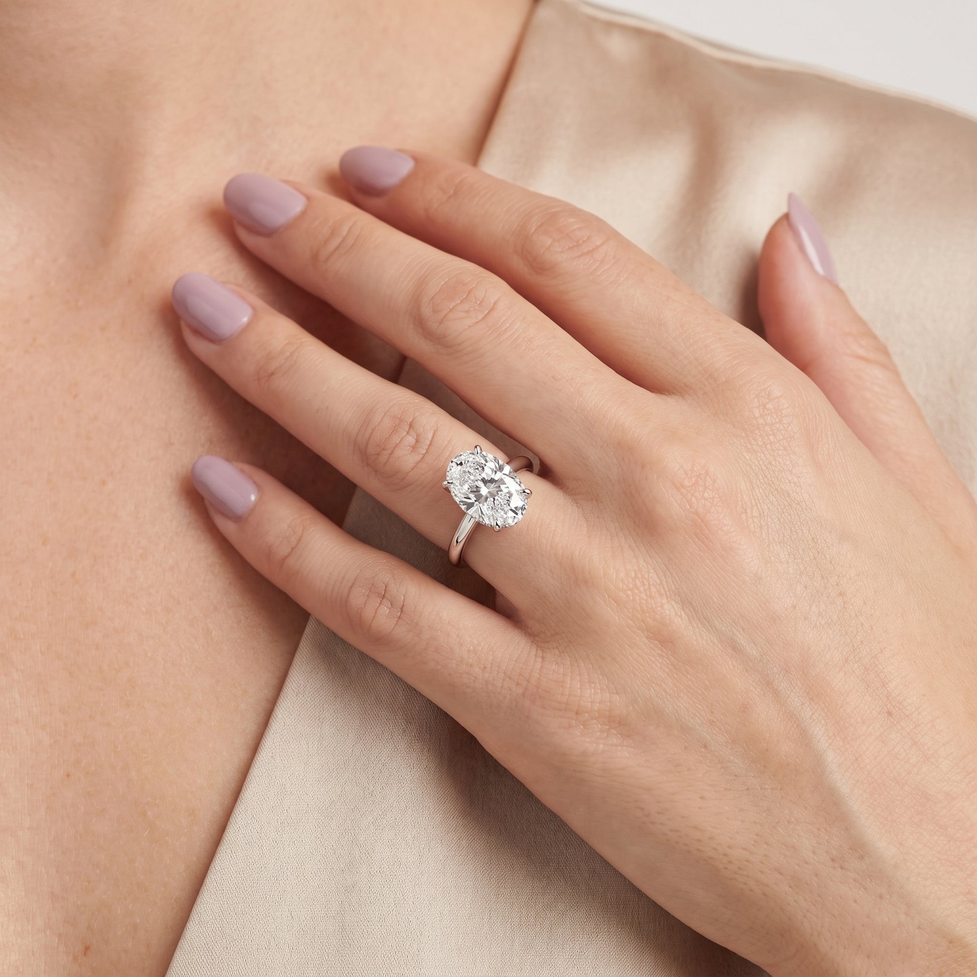 Amaya Hidden Halo Oval Diamond Ring in White Gold - model.jpg
