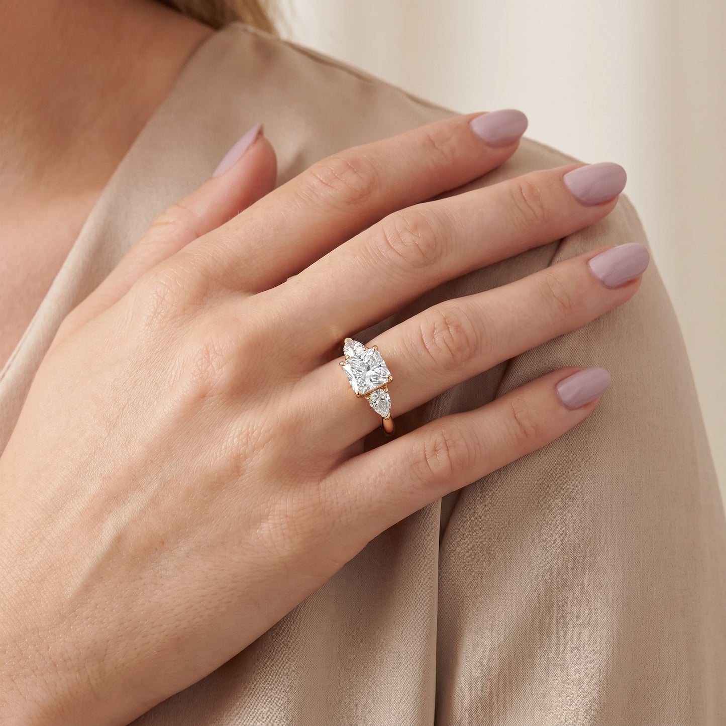 Mirabel Three-Stone Radiant Diamond Engagement Ring in Yellow Gold - model.jpg