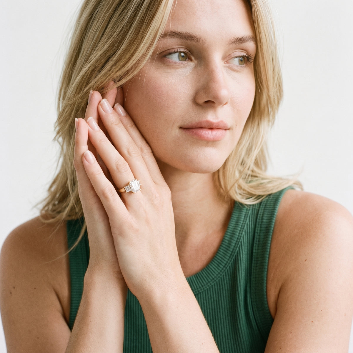 Aria Three-Stone Basket Radiant Diamond Engagement Ring in Yellow Gold - model.jpg