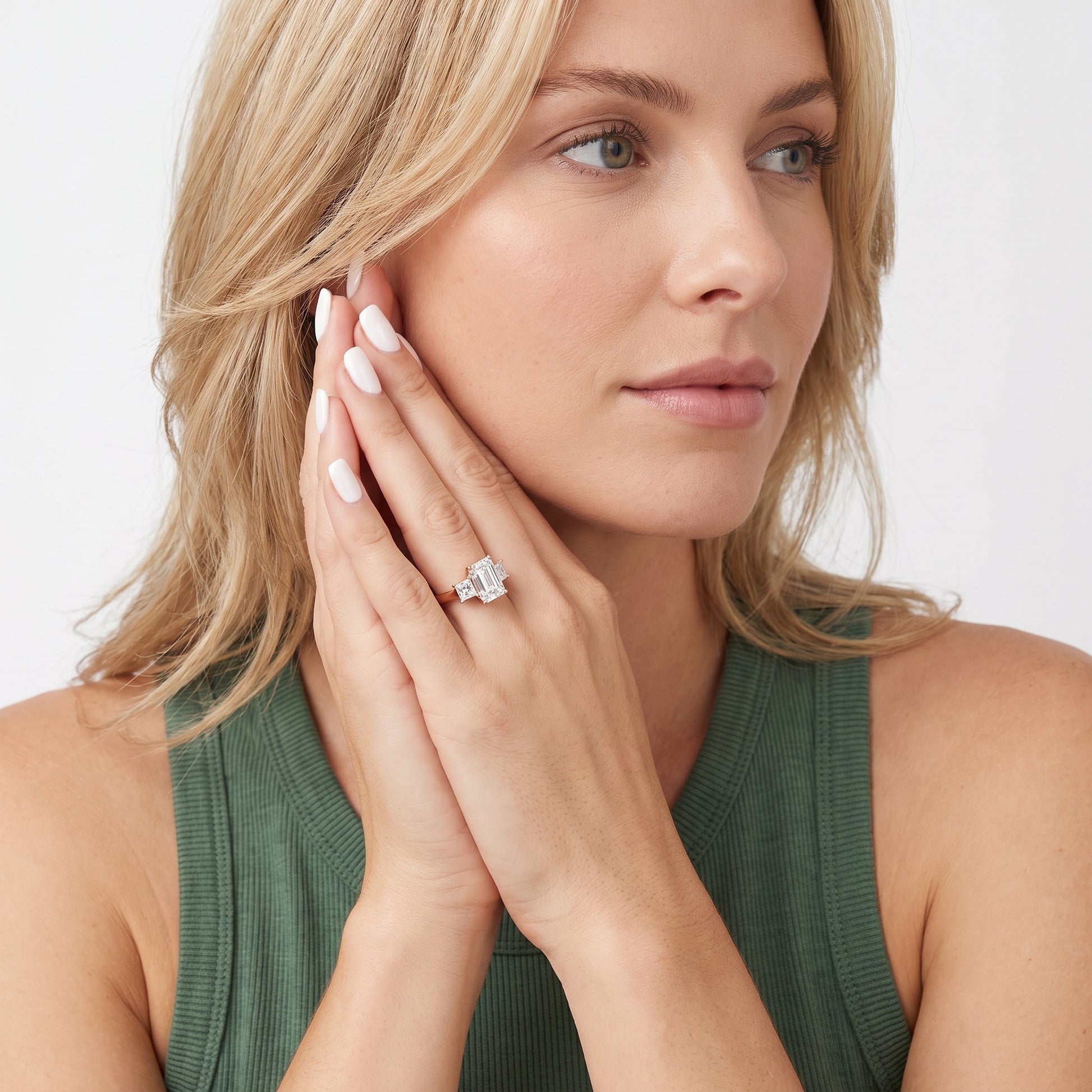 Sienna Three-Stone Emerald Diamond Ring in Rose Gold - model.jpg