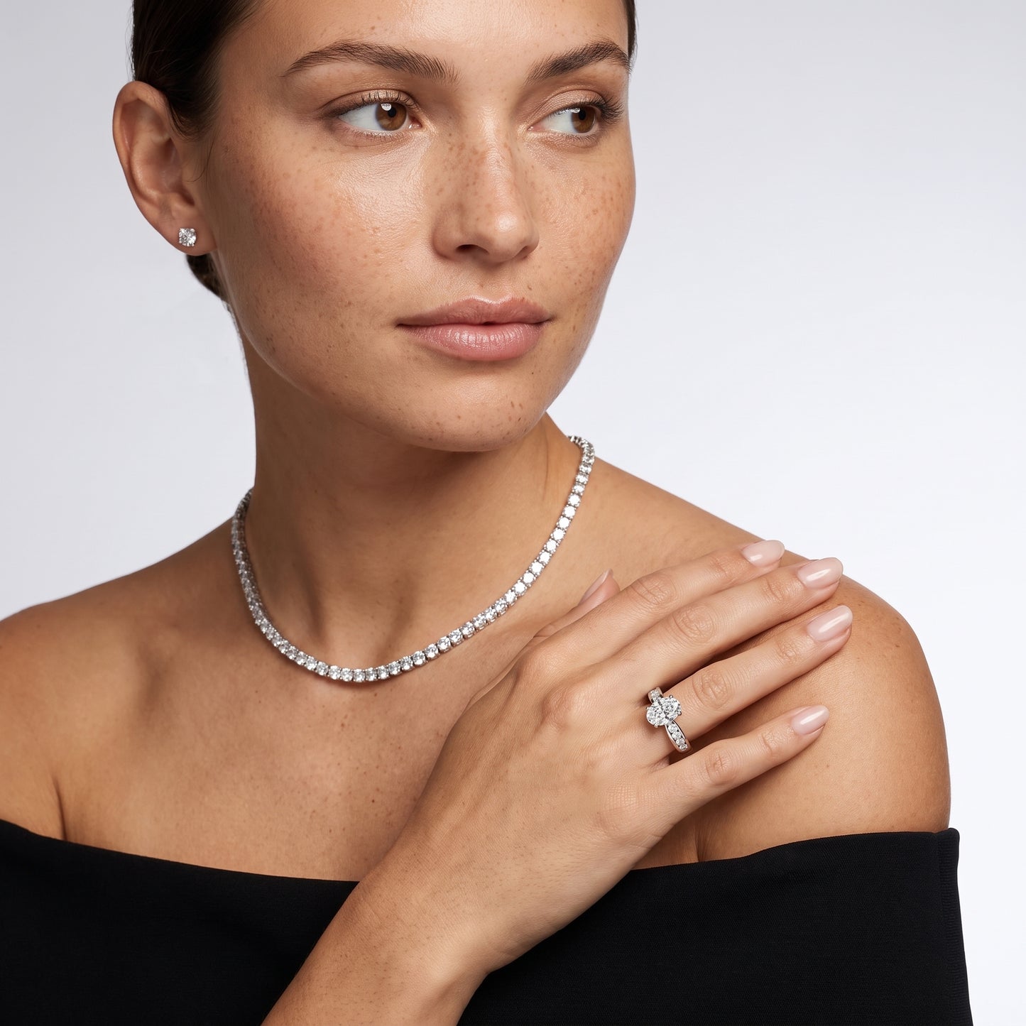 Noor Channel Set Sidestone Oval Diamond Engagement Ring in Platinum - model.jpg
