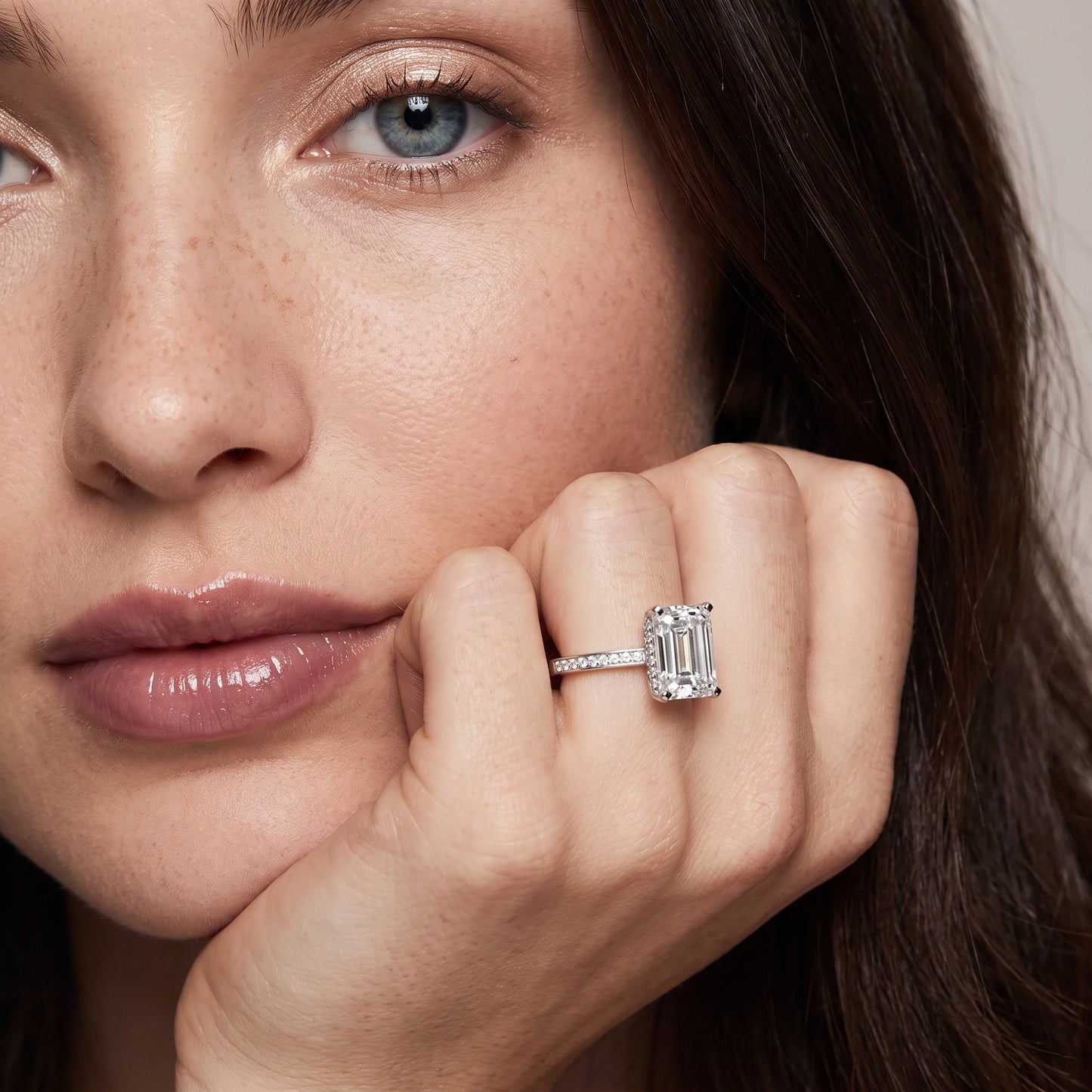 Naia Hidden Halo Emerald Diamond Ring in White Gold - model.jpg