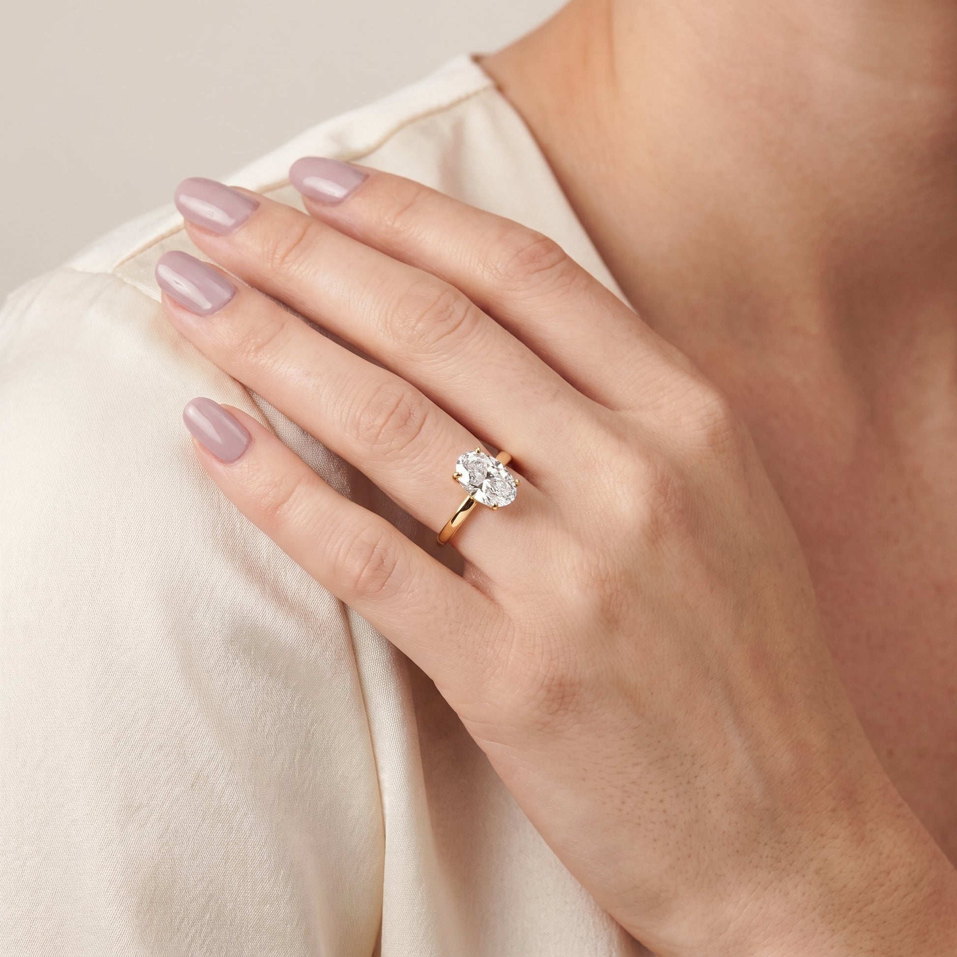 Liana Solitaire Claw Prong Oval Diamond Engagement Ring in Yellow Gold - model.jpg