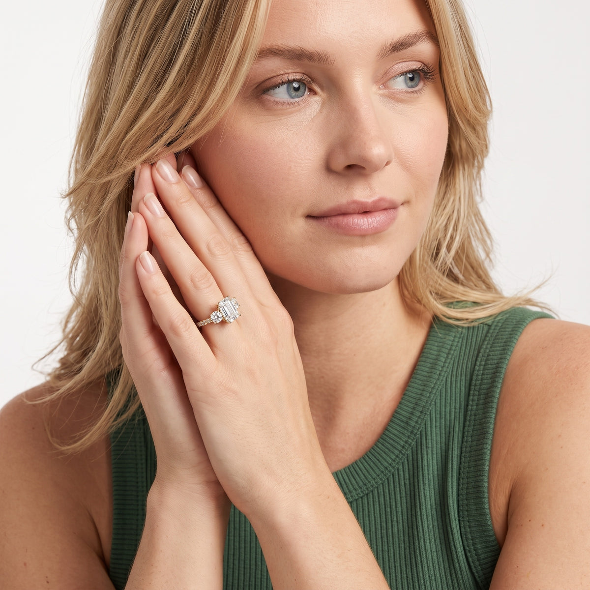 Sibyl Trellis Three-Stone Emerald Diamond Engagement Ring in Yellow Gold - model.jpg