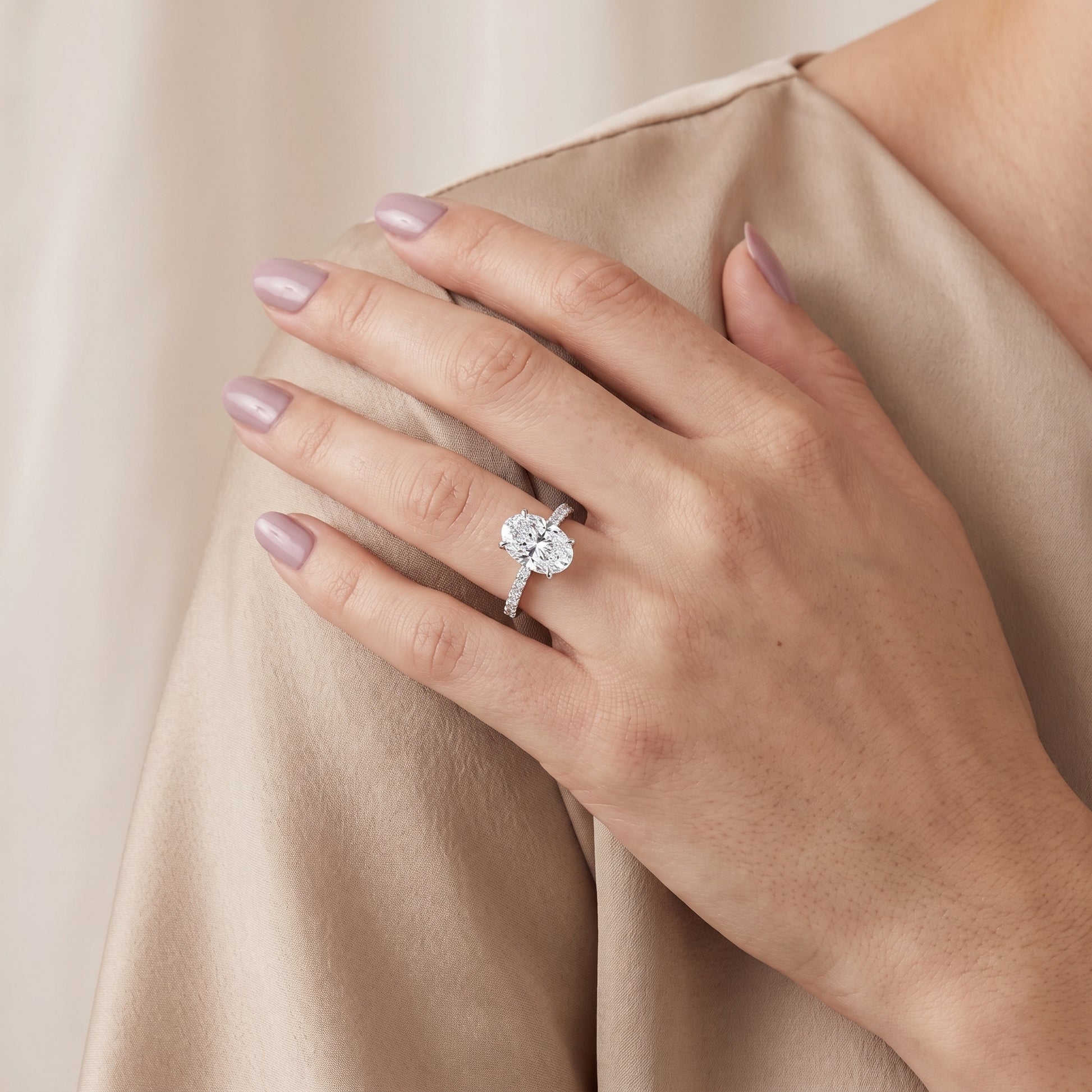 Ione Solitaire Pavé Oval Diamond Engagement Ring in Silver - model.jpg