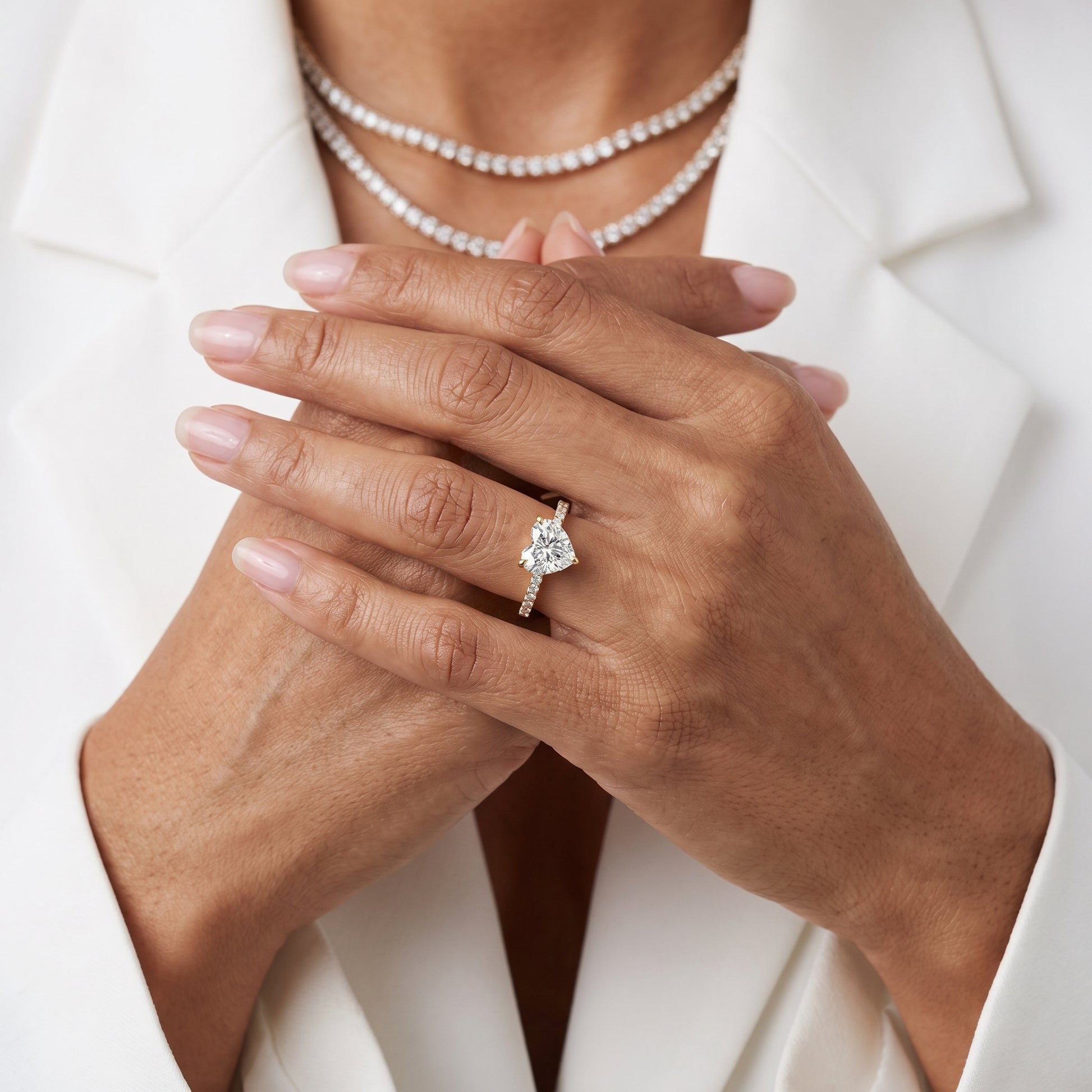 Ione Solitaire Pavé Heart Diamond Engagement Ring in Yellow Gold - model.jpg