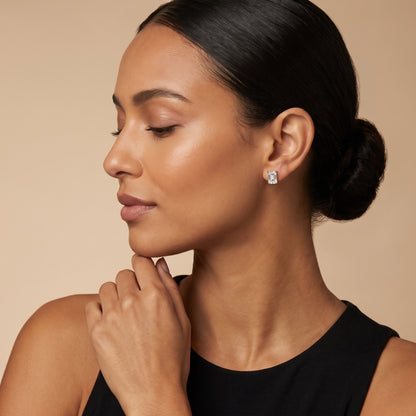 Four Prong Emerald Diamond Stud Earrings in Yellow Gold - on model