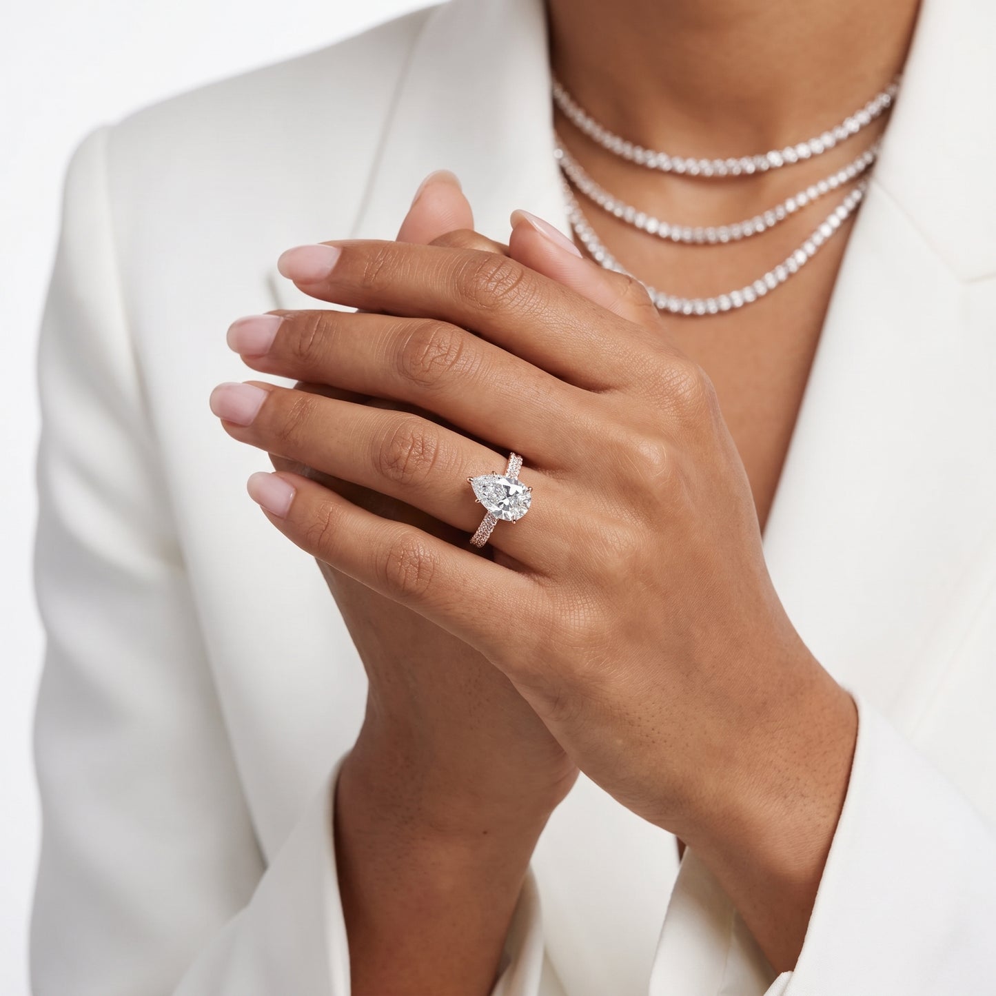 Della Hidden Halo Pavé Pear Diamond Engagement Ring in Rose Gold - model.jpg