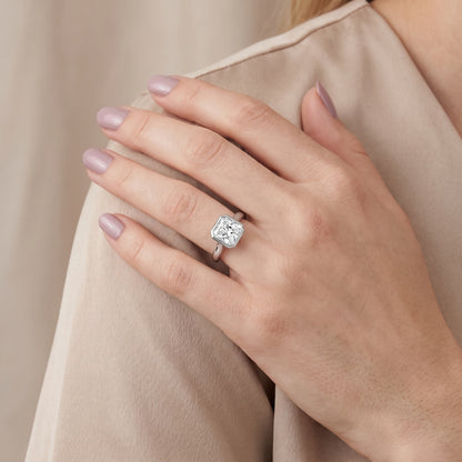 Jolie Bezel Solitaire Radiant Diamond Engagement Ring in Platinum - model.jpg