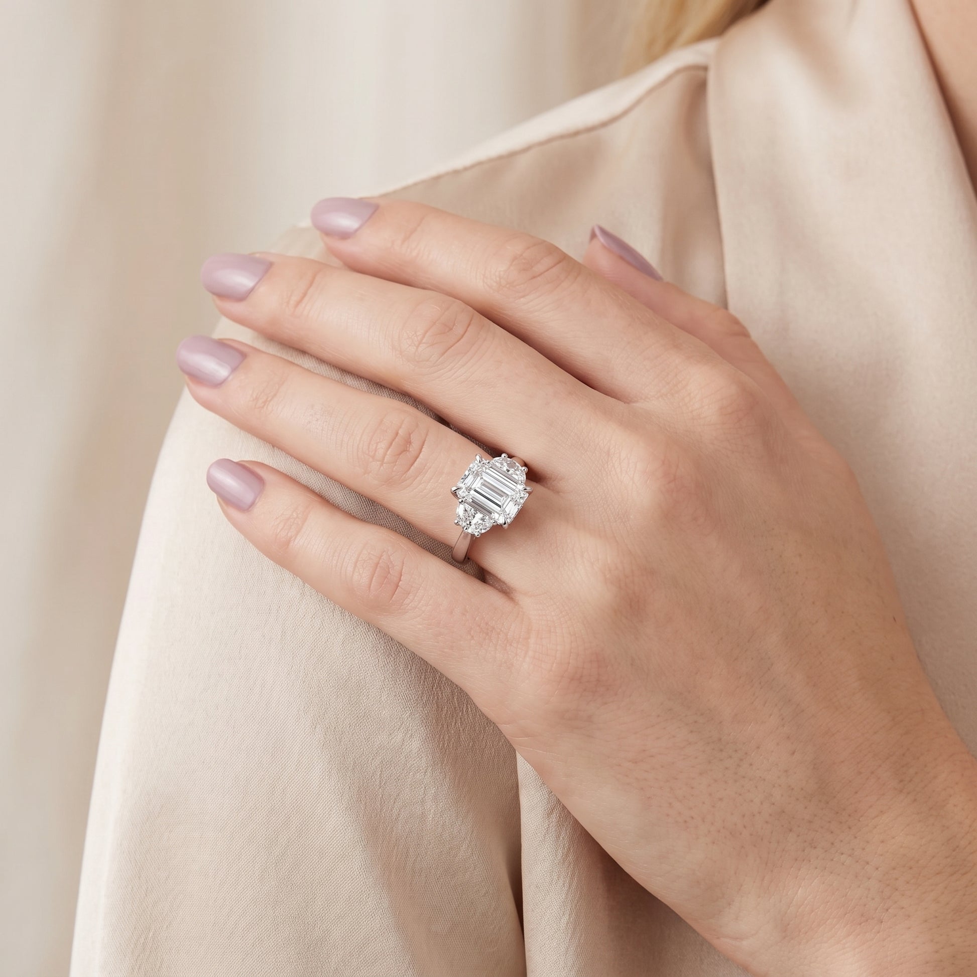 Romy Three-Stone Emerald Diamond Engagement Ring in Silver - model.jpg