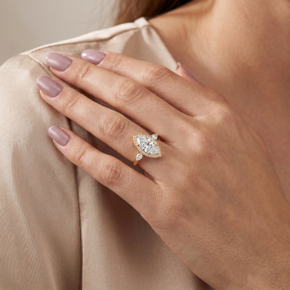 Eliza Halo Sidestone Marquise Diamond Engagement Ring in Yellow Gold - model.jpg
