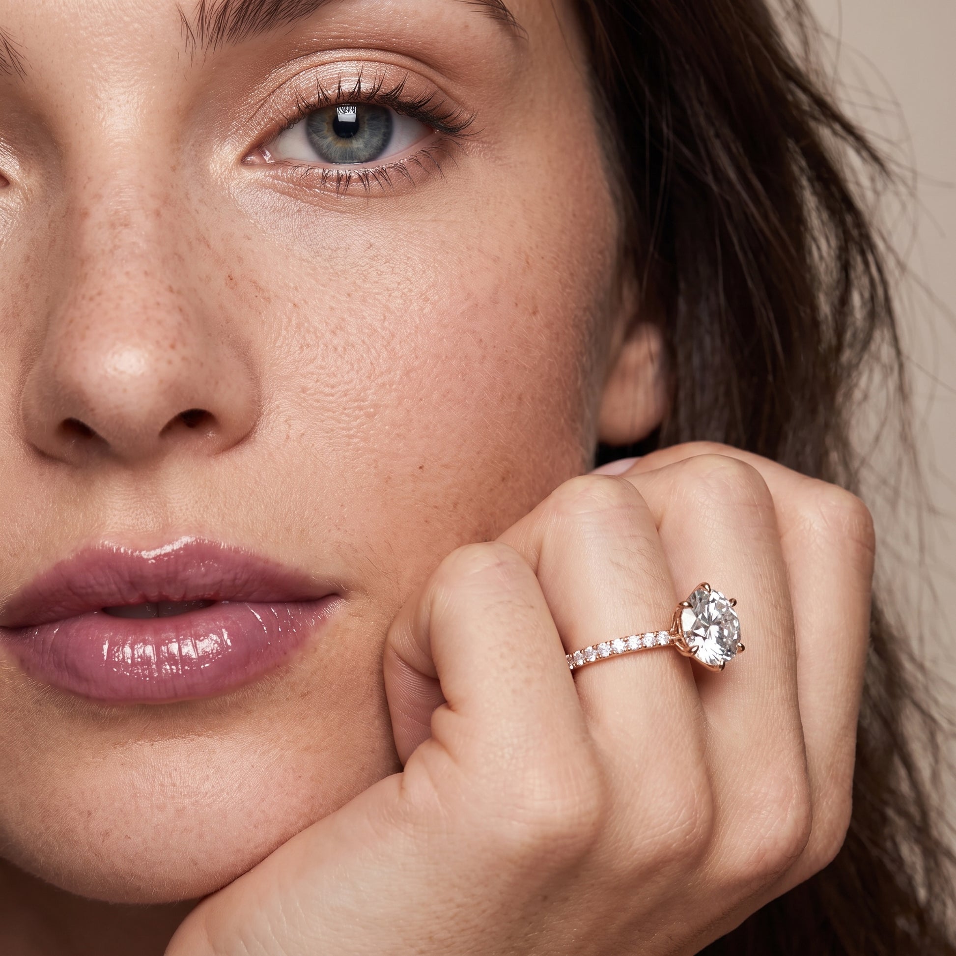 Novara Solitaire Pavé Round Diamond Ring in Rose Gold - model.jpg