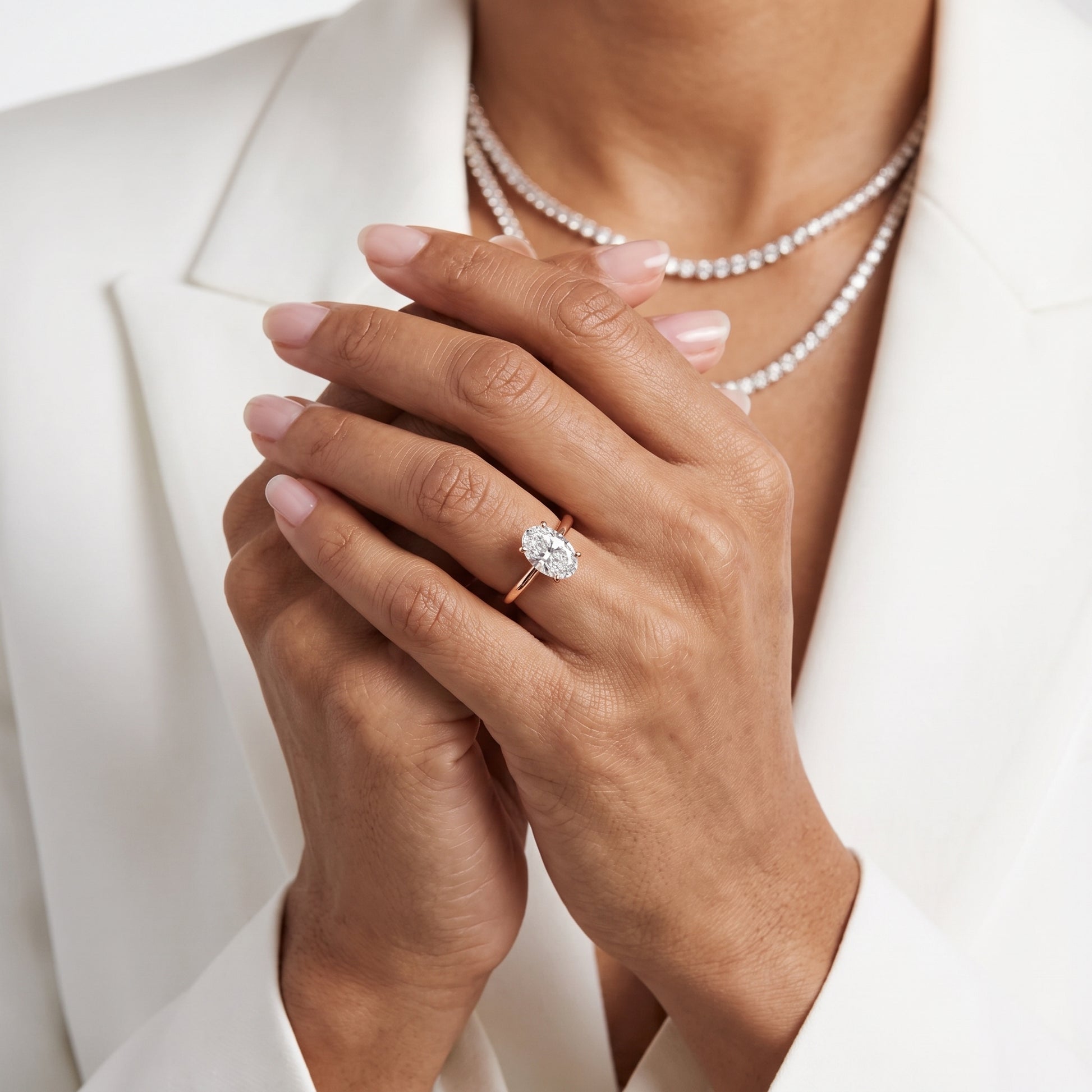 Wren Solitaire Oval Diamond Ring in Rose Gold - model.jpg