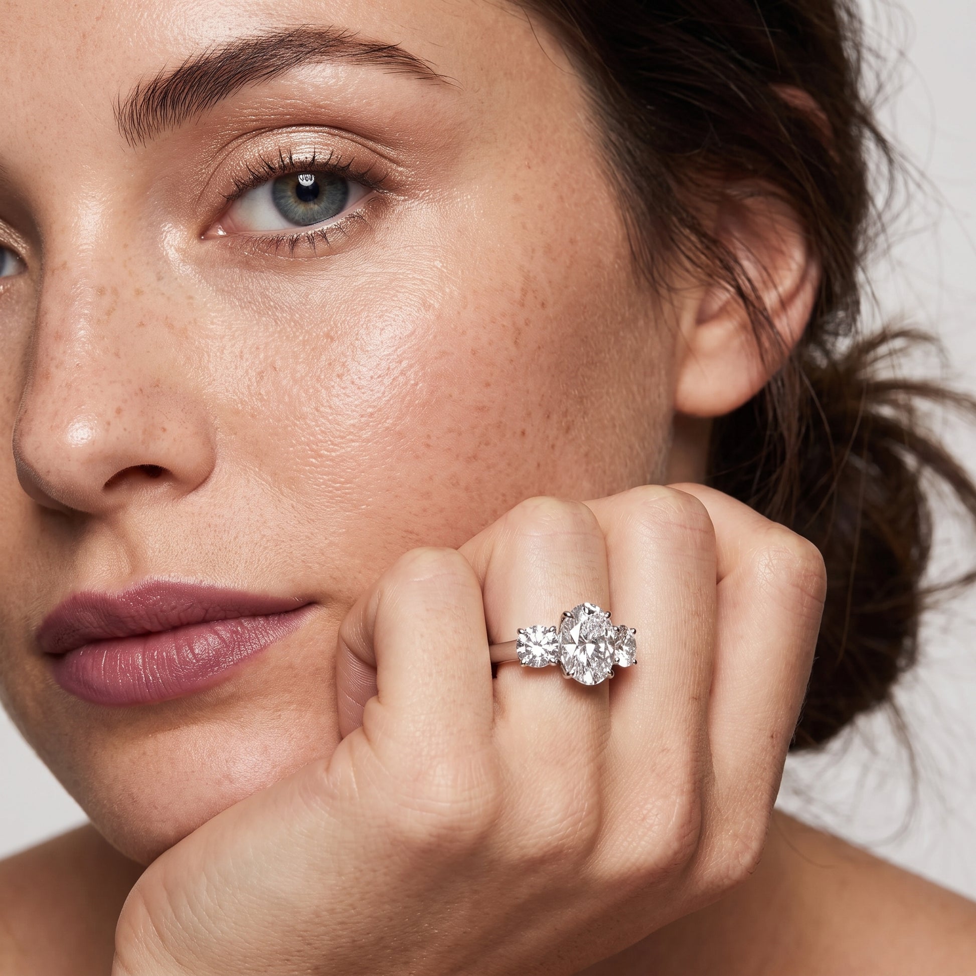 Esme Three-Stone Tapered Oval Diamond Ring in White Gold - model.jpg
