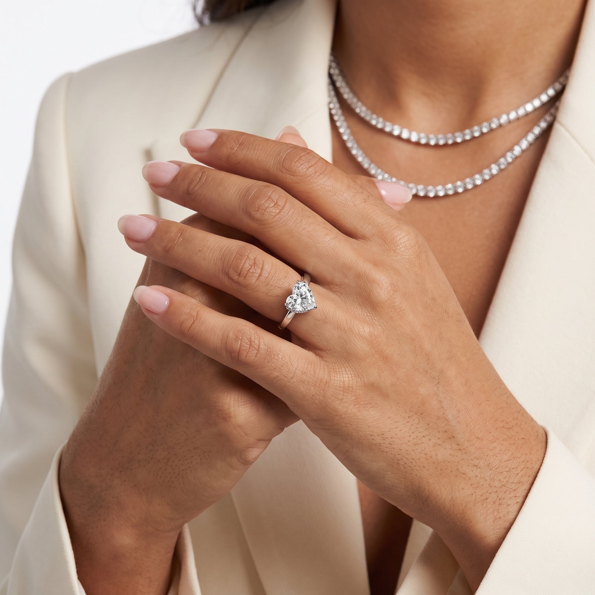 Lara Hidden Halo Heart Diamond Engagement Ring in Silver - model.jpg