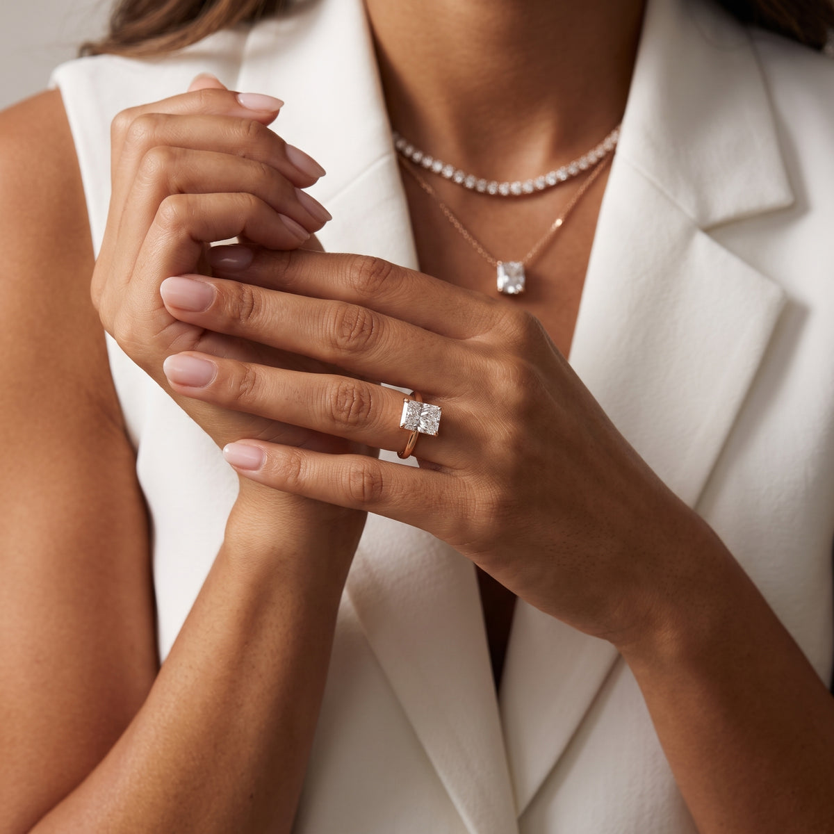 Nadia Petite Solitaire Radiant Diamond Engagement Ring in Rose Gold - model.jpg