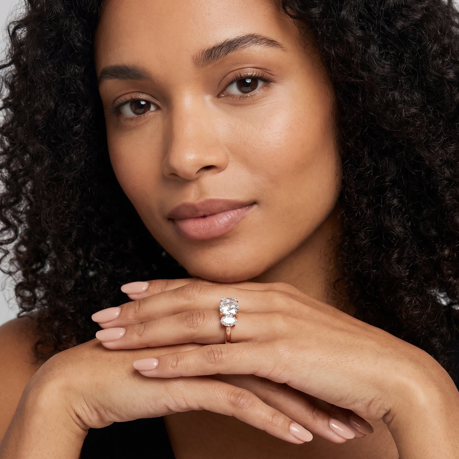 Lila Three-Stone Cushion Diamond Ring in Rose Gold - model.jpg