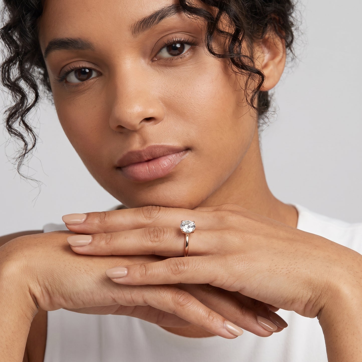 Nella Petite Solitaire Round Diamond Engagement Ring in Rose Gold - model.jpg